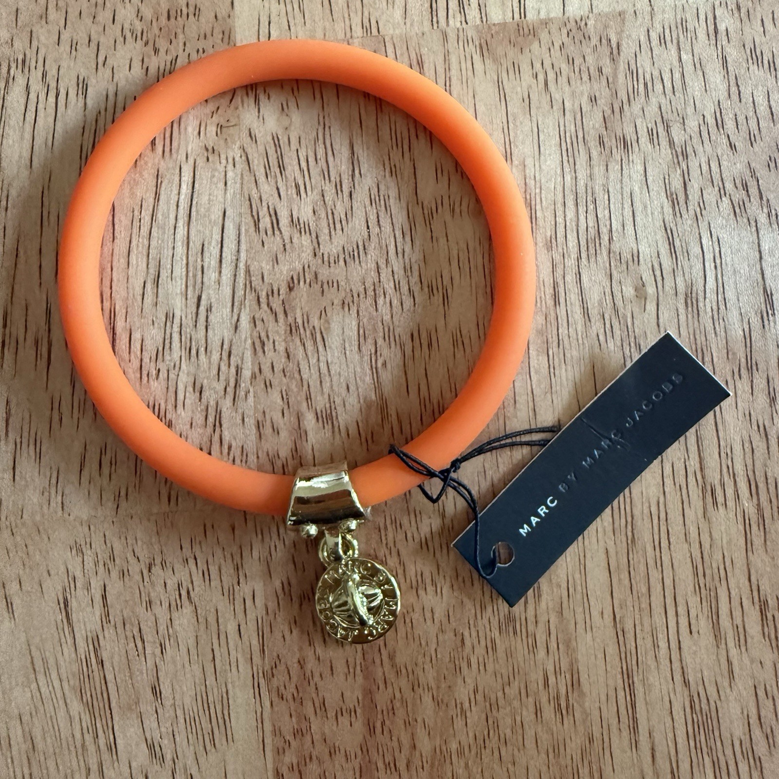 Marc by Marc Jacobs Orange Elastic Silicone Bracelet w/ Gold-Tone Logo Charm NWT
