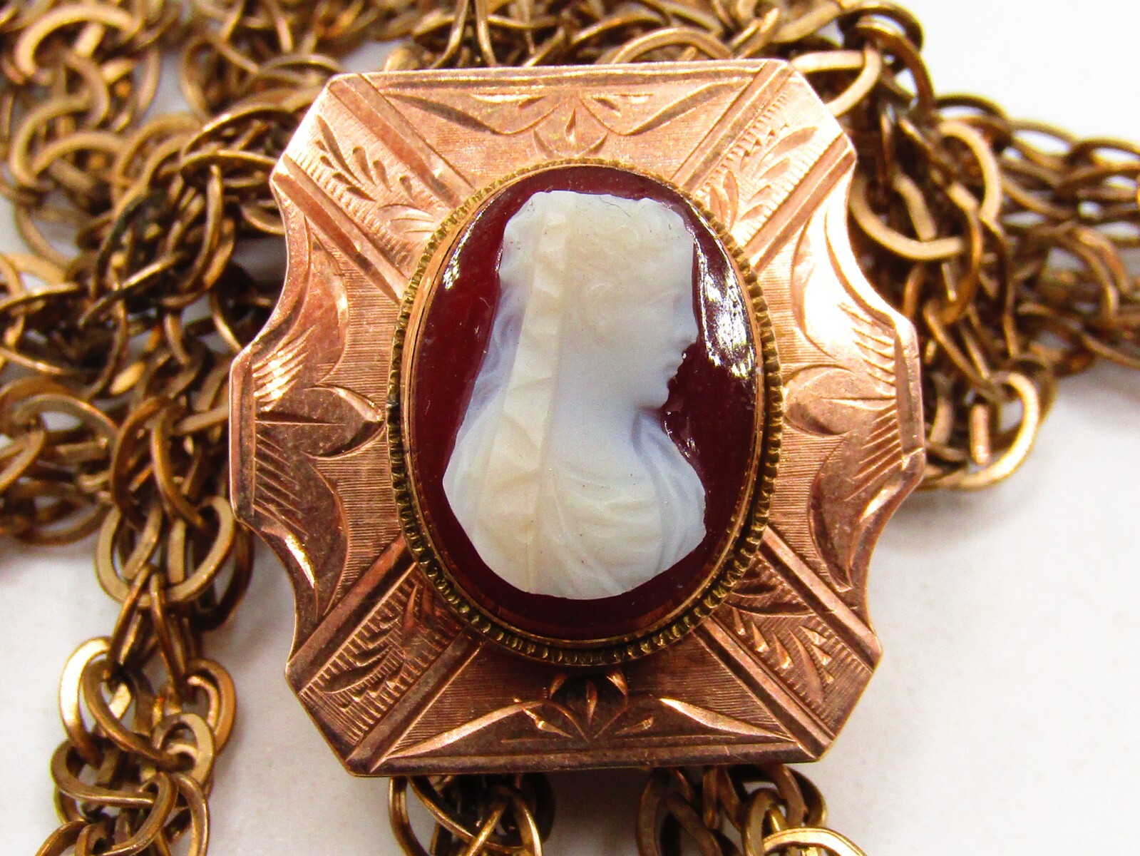 ANTIQUE VICTORIAN LADIES WATCH CHAIN WITH 1OK GOLD CAMEO SLIDE & G.F. CHAIN*