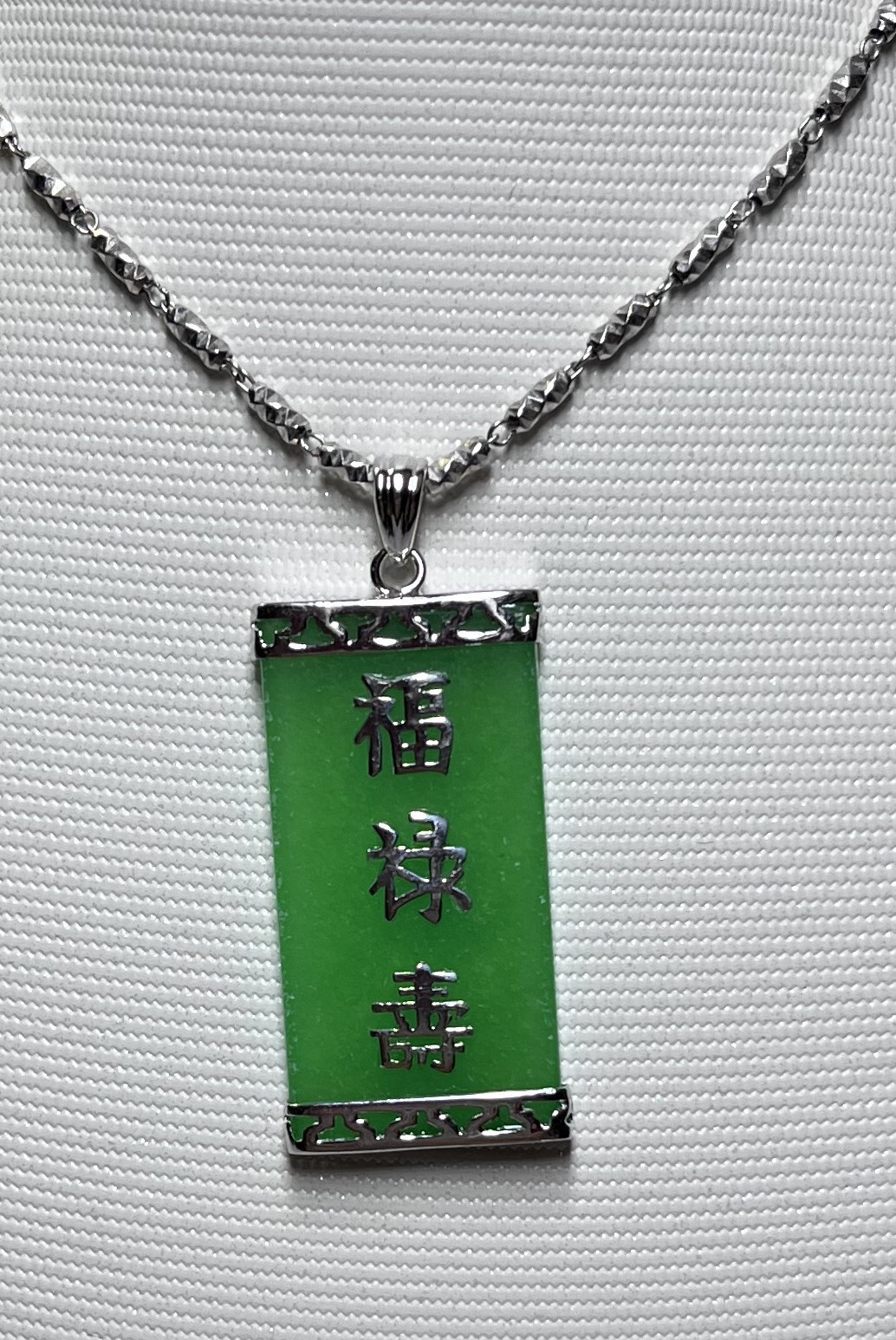 15×30 mm green jade pendant set in sterling silver (925) with Chinese characters