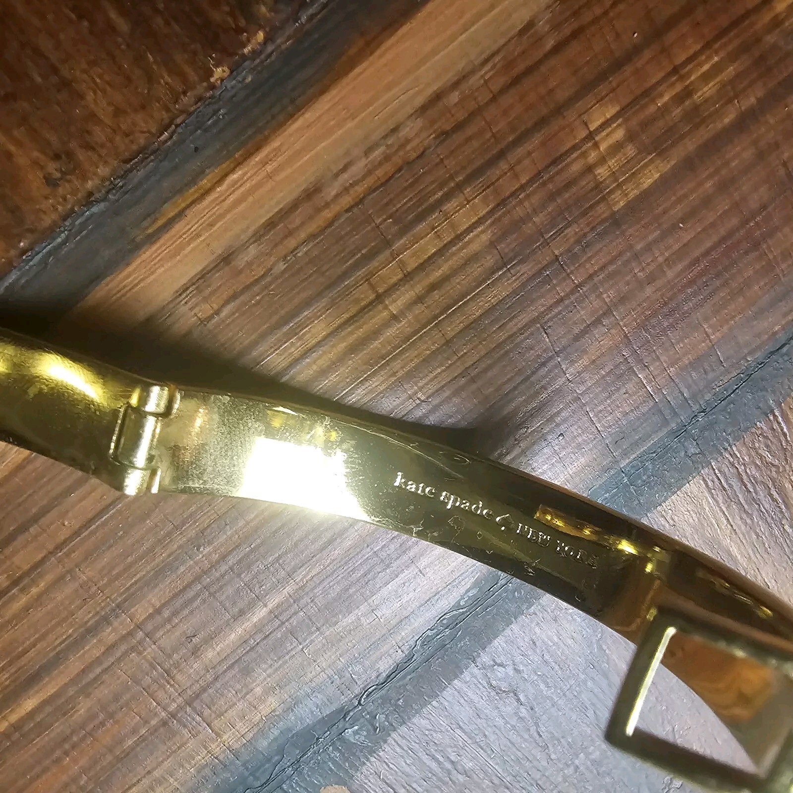 Kate Spade Signed Gold Tone Cream Enamel Turn Lock Hinged Bracelet