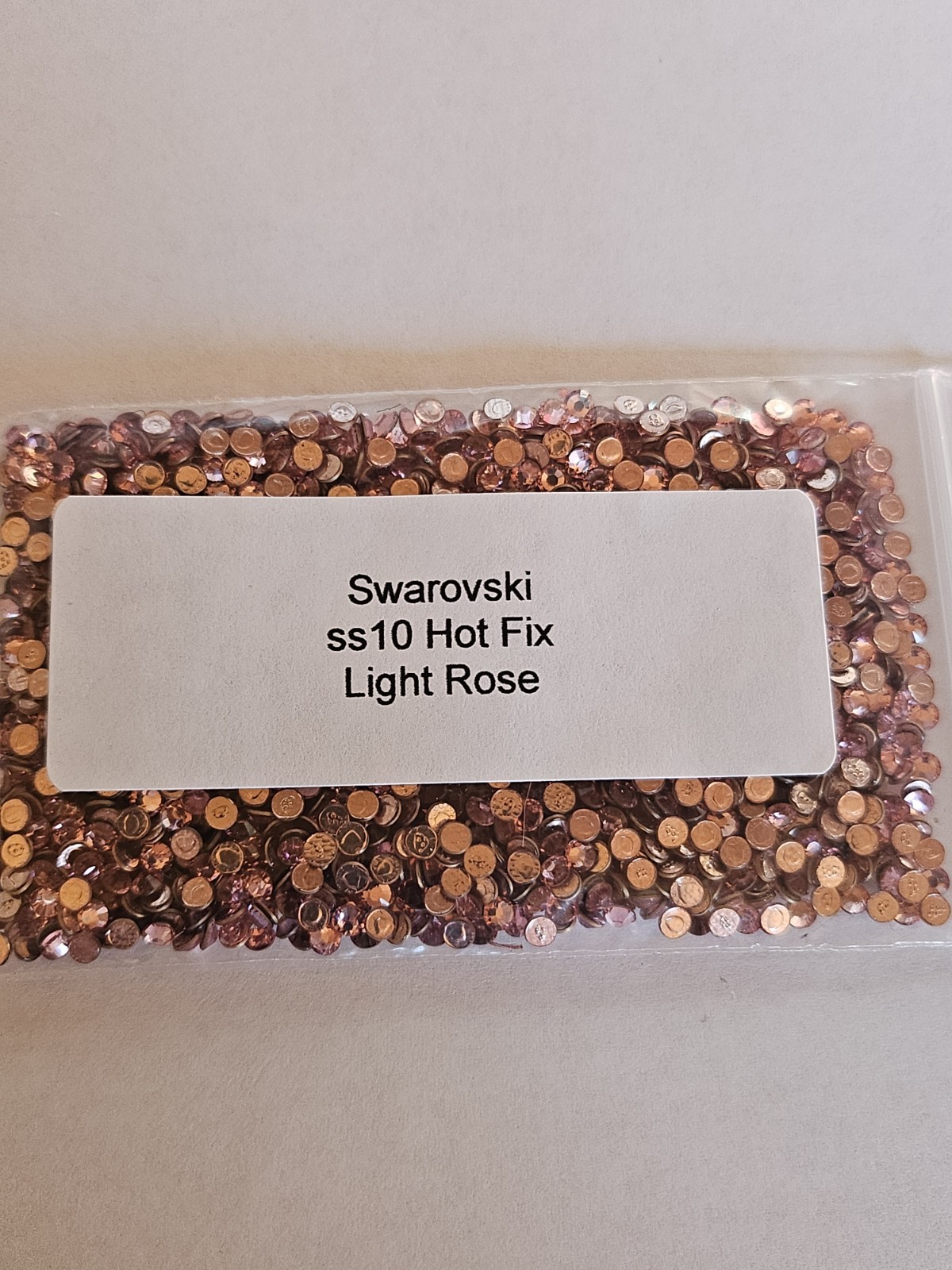 Genuine Swarovski ss10 Hot Fix Crystals in the color LIGHT COLORADO TOPAZ