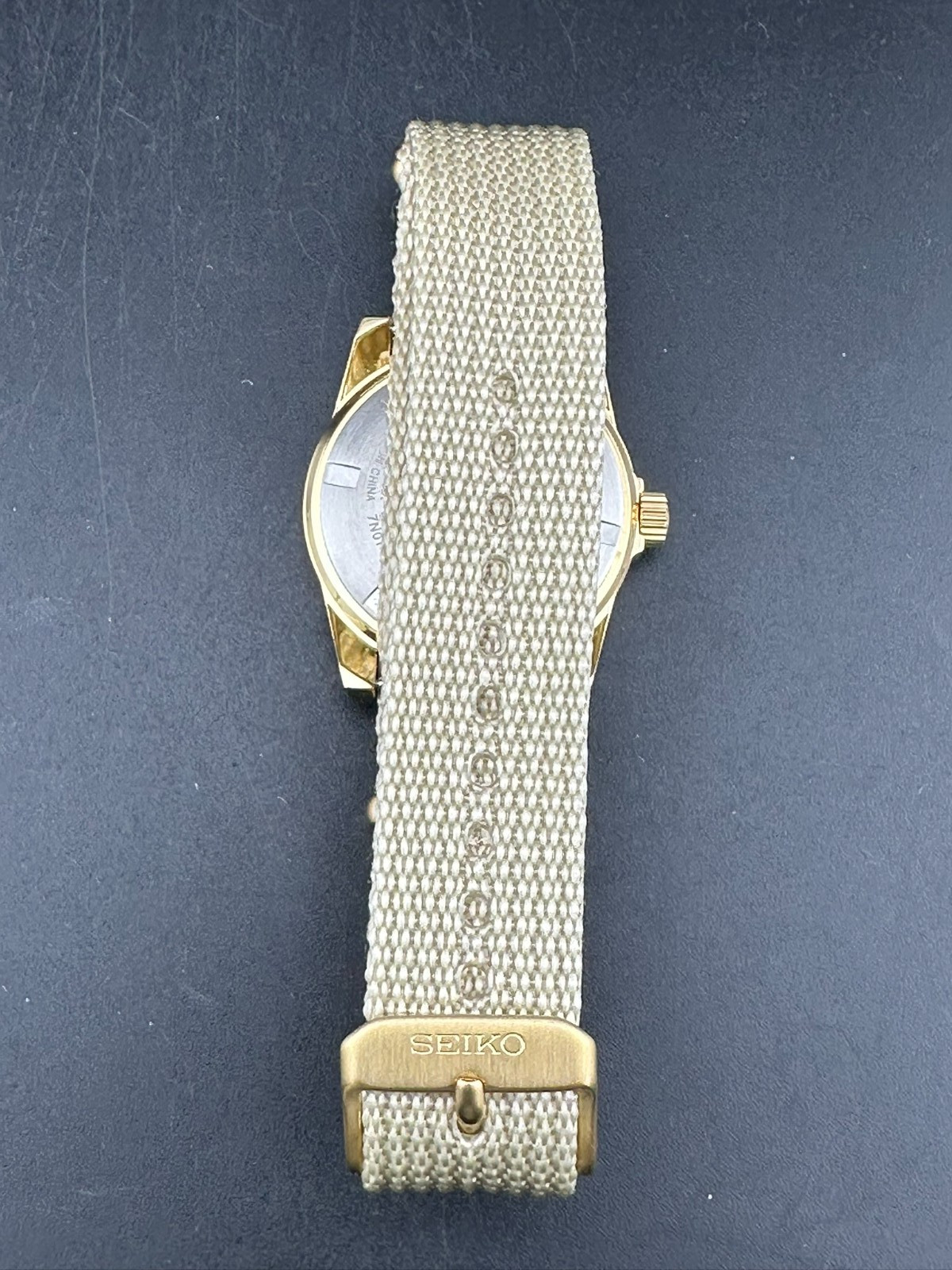 Seiko SUS Nano Universe Men’s Silver Dial Gold Tone 35mm Quartz Watch 7N01-0KL0