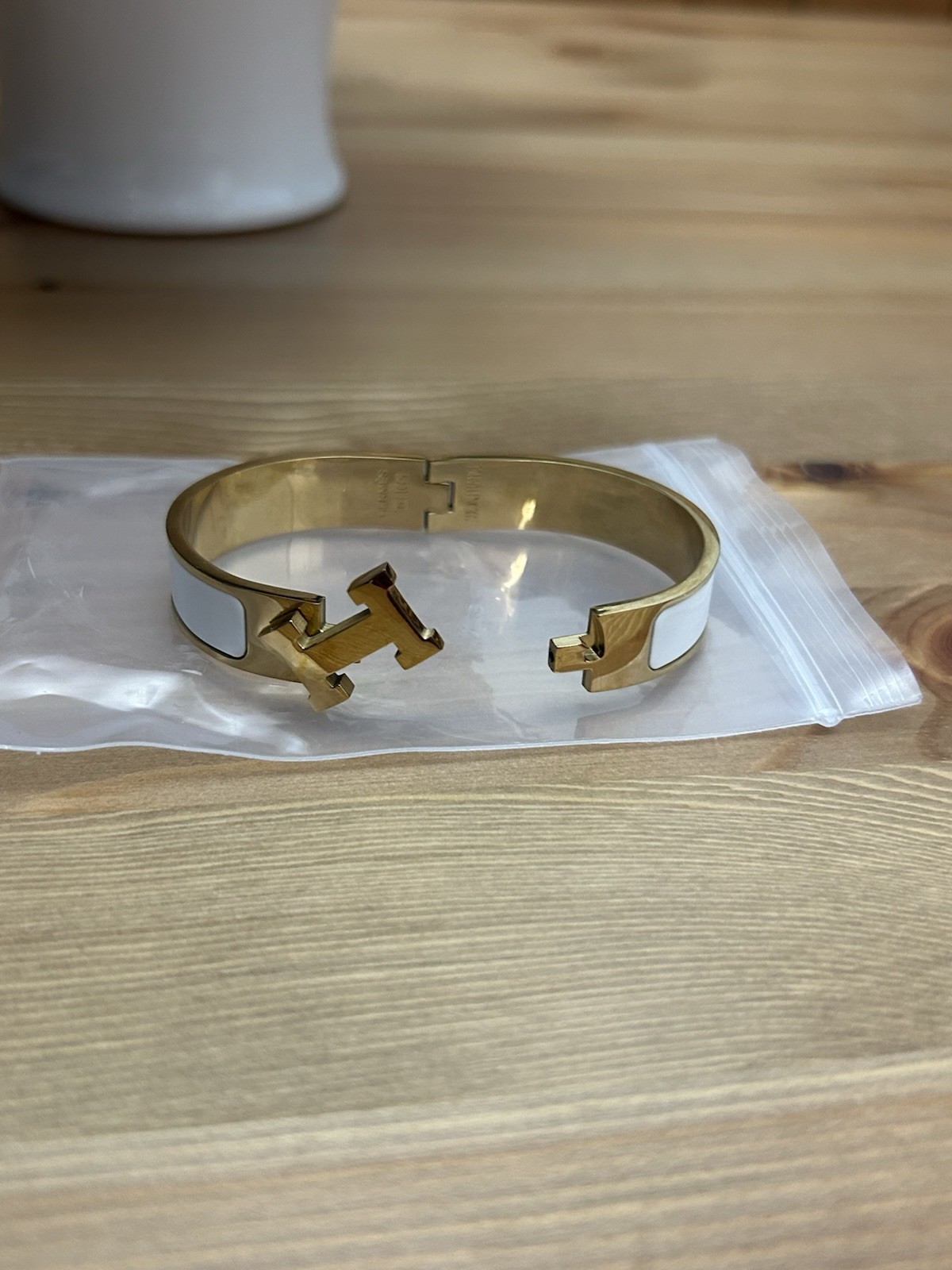 Hermès Signed Enamel Hinged Bangle Bracelet Gold Tone White Gold/White