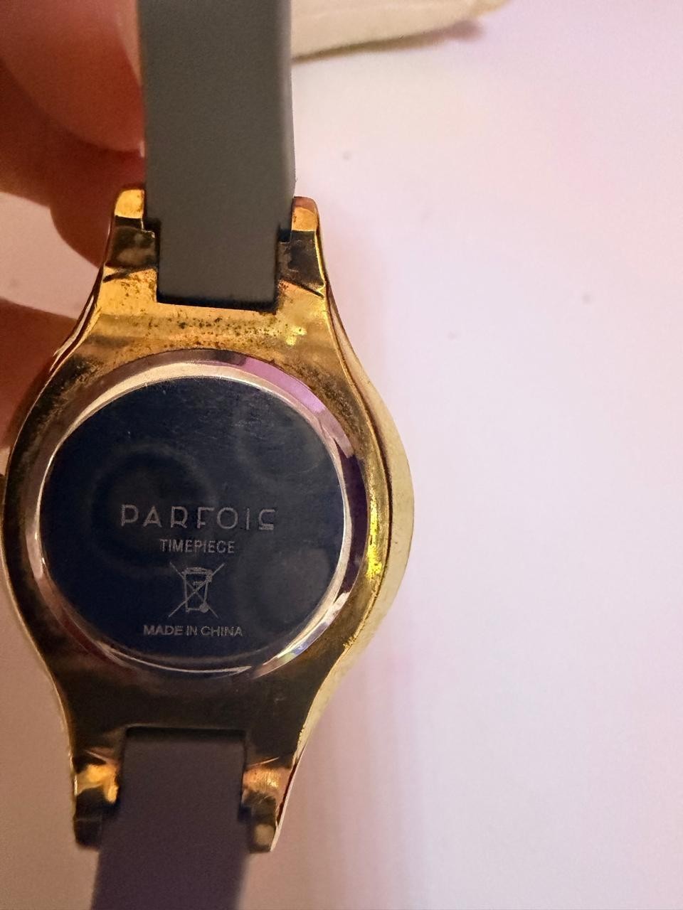 Elegant Parfois Women’s Wristwatch Featuring A Gold-Tone Case And Black Strap