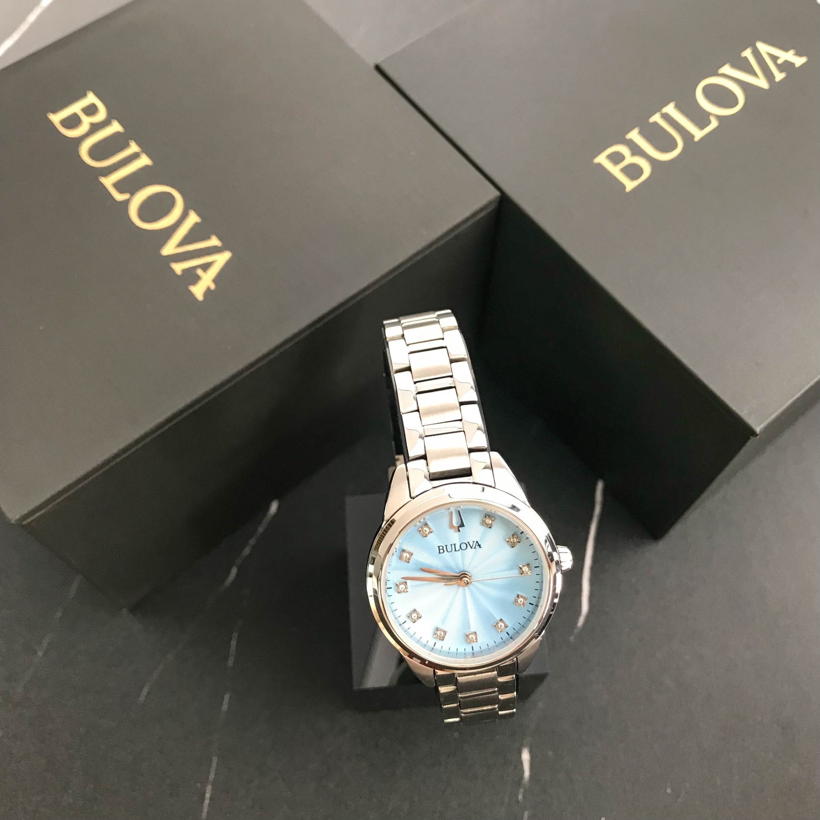 Bulova Classic Sutton 96P250 Blue Dial 28MM Quartz Ladies Watch with 11 Diamonds