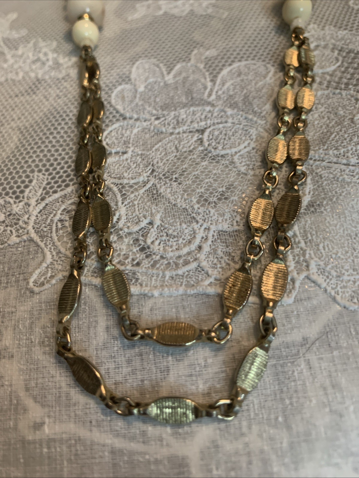 1928 Shiny Gold Tone 36″ Double Chain Necklace Clear, Beige, Gold, Wood Beads