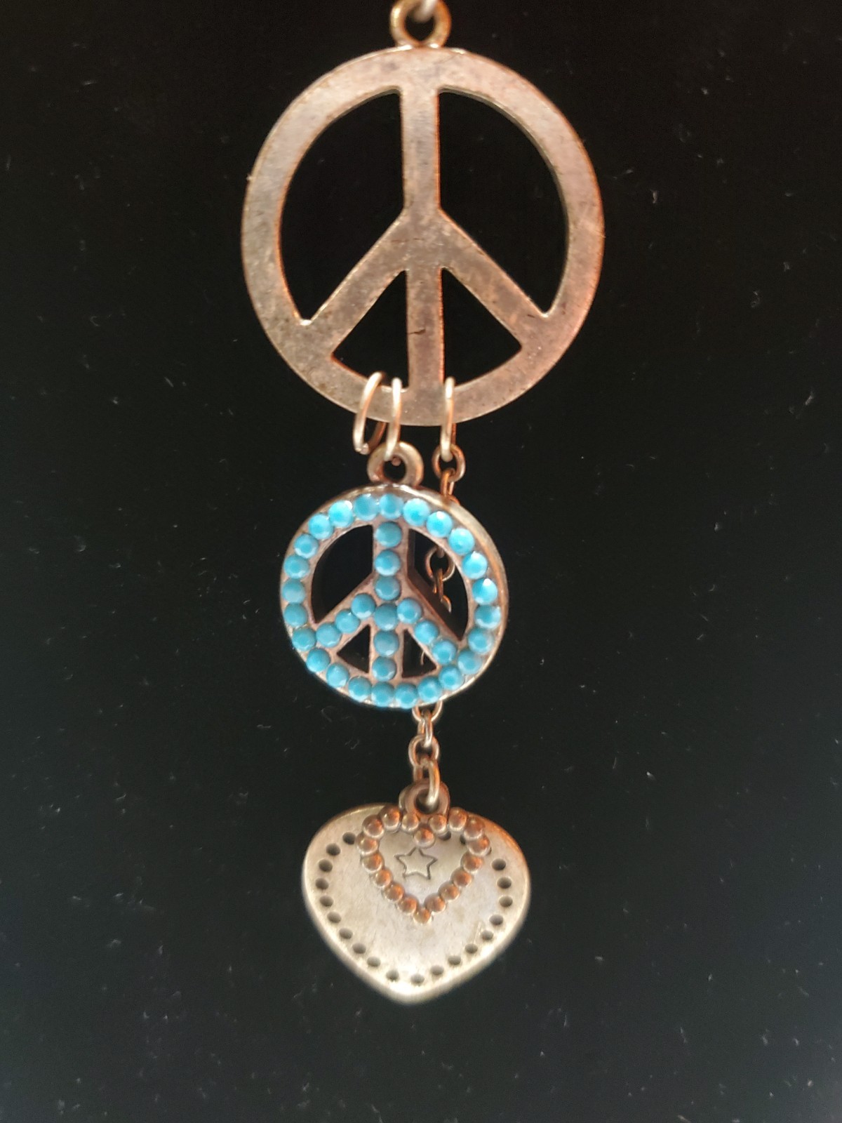 vintage necklace from 60-70’s original hippy days. peace and love signs.