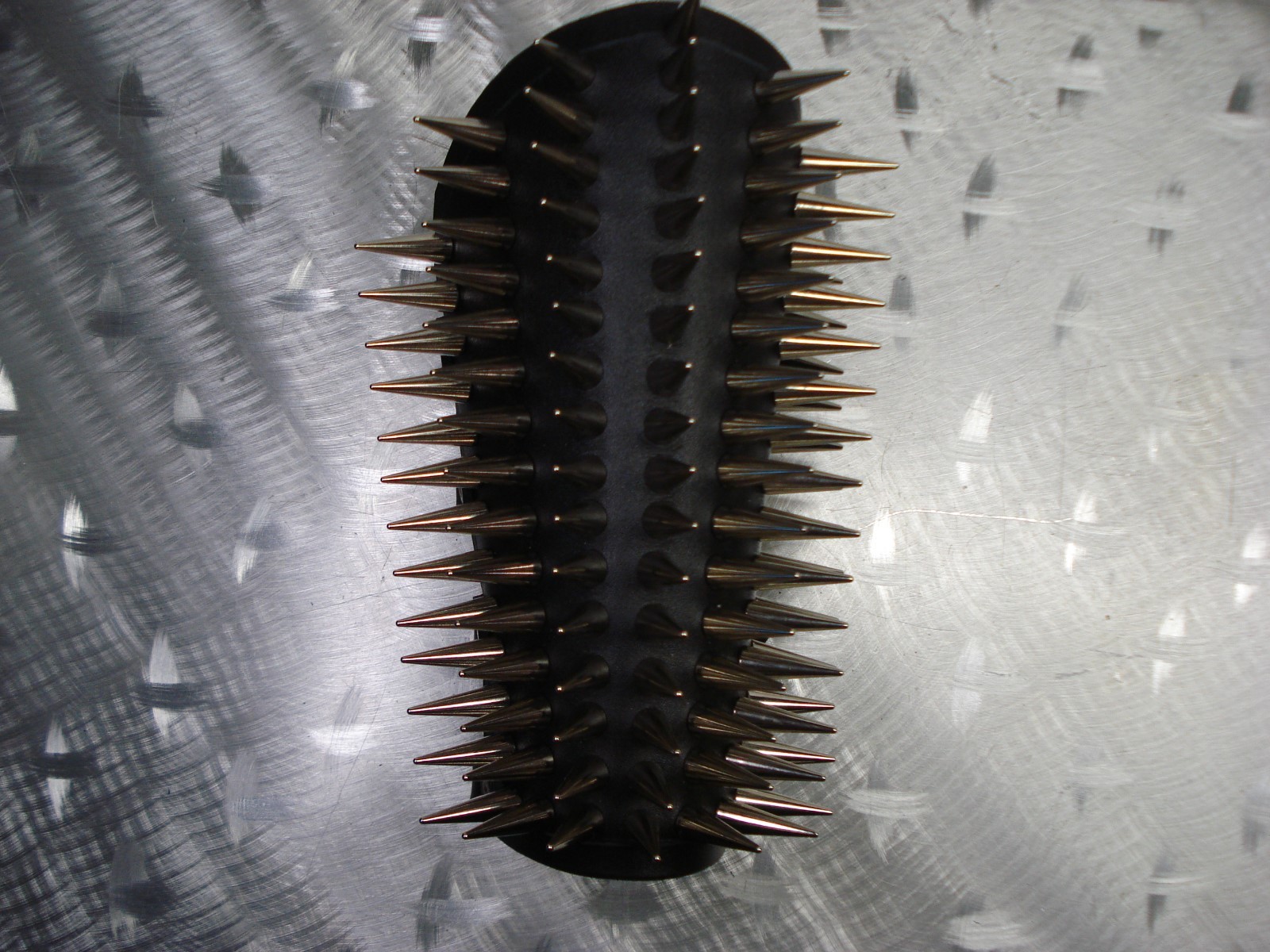 LEATHER SPIKED CONE GAUNTLET. BLACK METAL… (MDLG0231)….. BEHEXEN