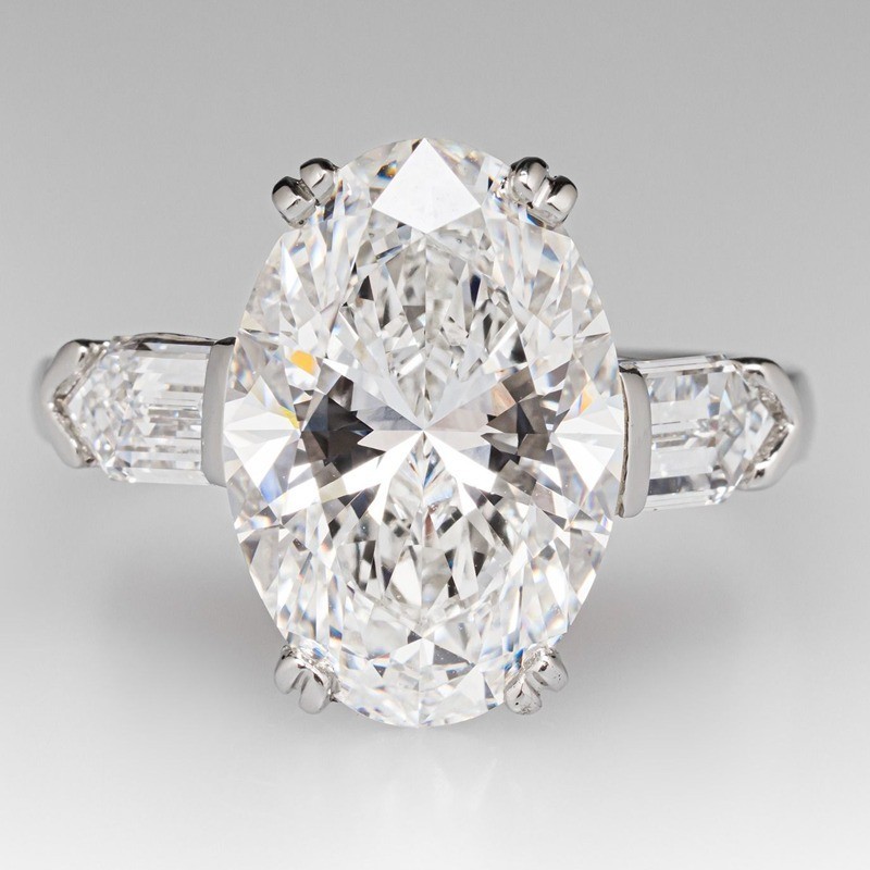 5.43 TCW Oval Cut Moissanite Three Stone Engagement Ring 14K White Gold Plated