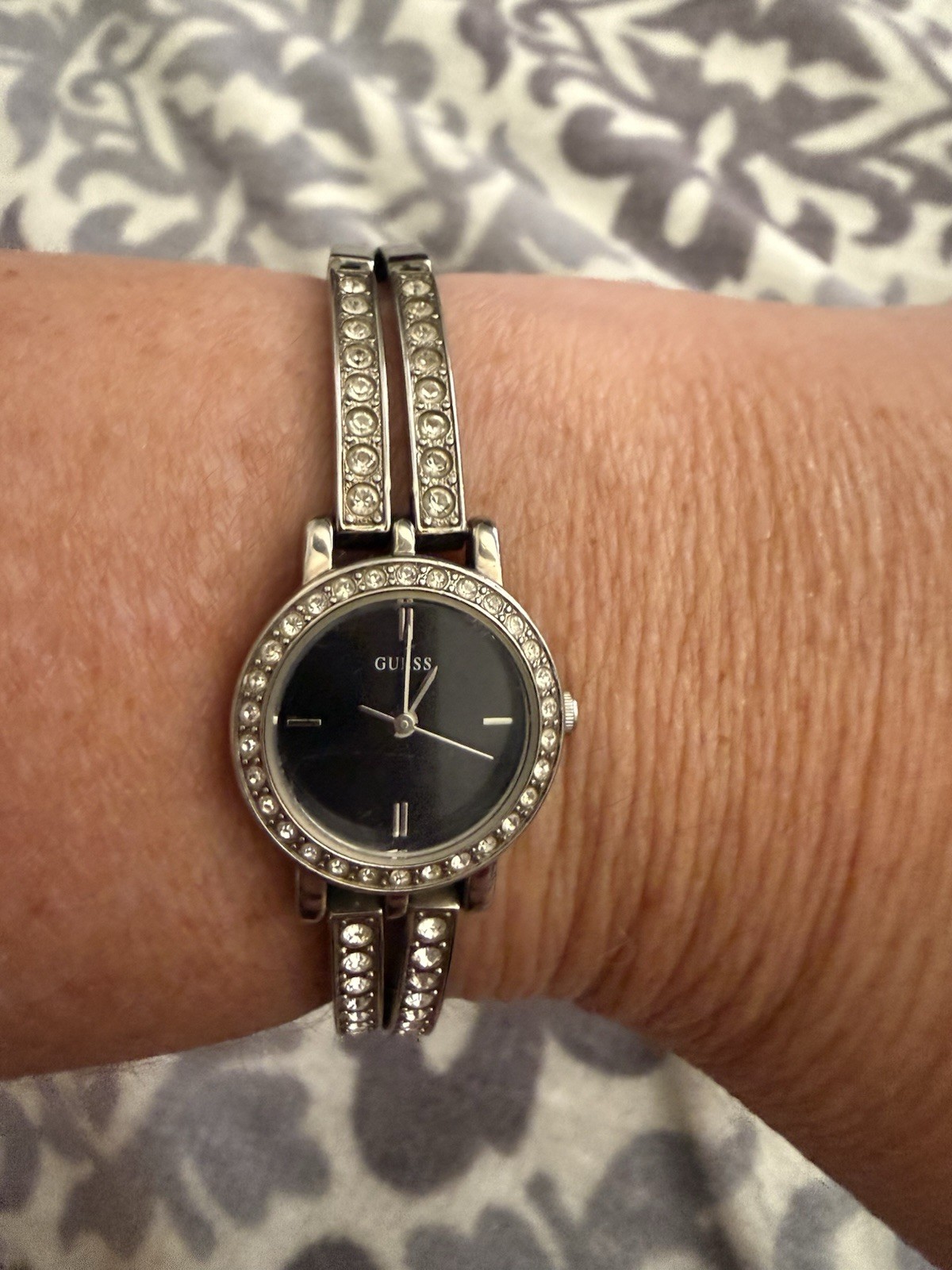 Guess G75823L Silver Tone Bangle Watch Black Dial Crystal Accent