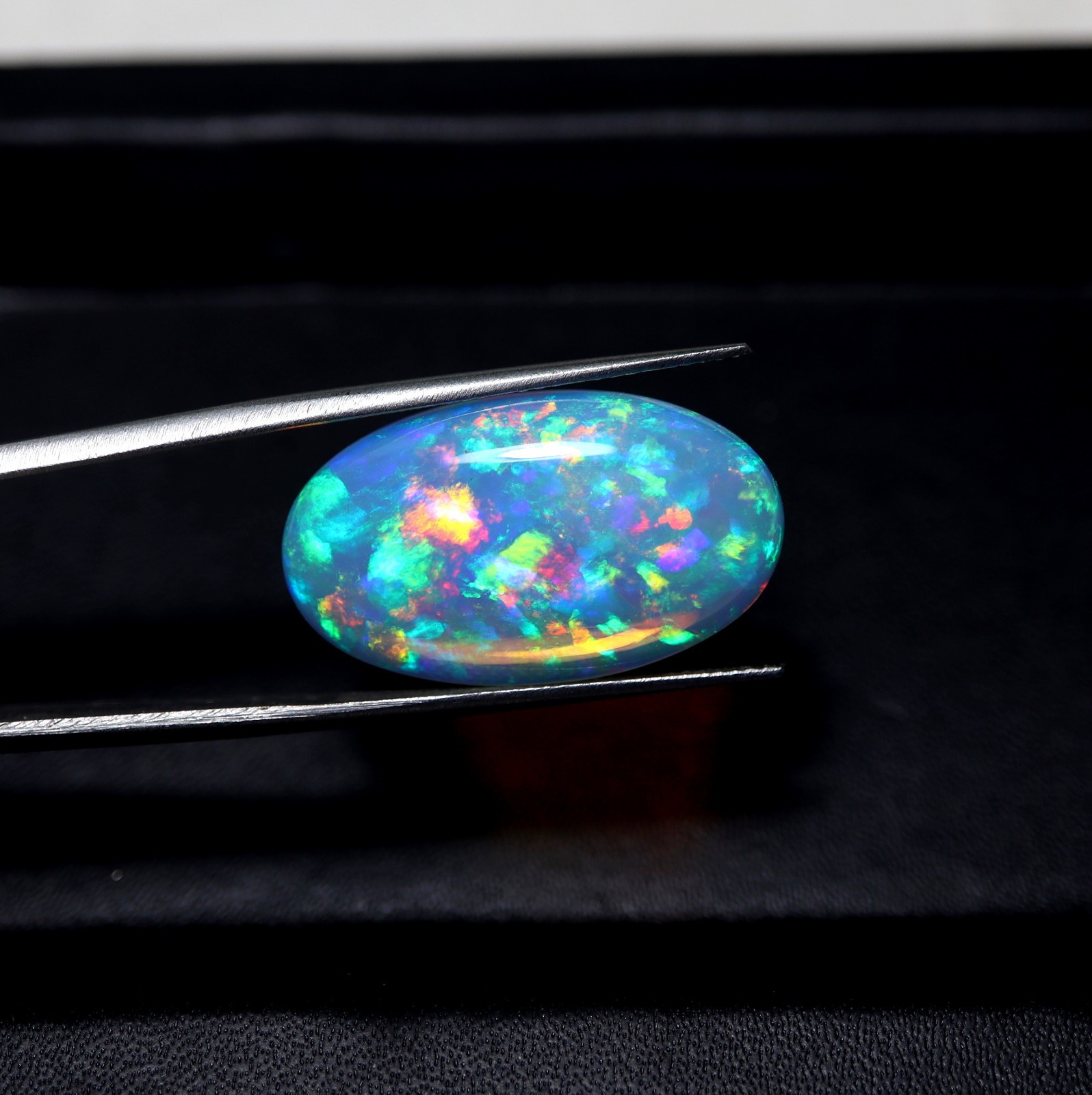 9.2 Ct 24.7×14.5 MM Natural Top Grade Rainbow Fire Ethiopian Opal Oval Cabochon