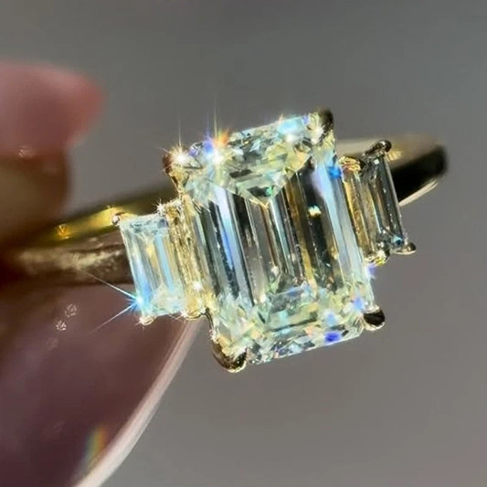 3.7CTW Emerald Cut Moissanite Three Stone Engagement Ring 14K Yellow Gold Plated