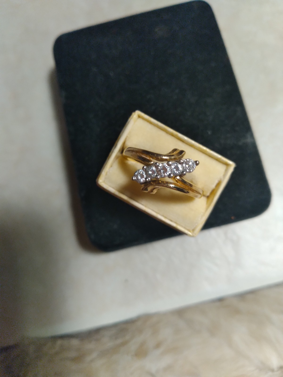 14K Yellow Gold Ring With A Cluster Of 5 Diamonds In A Bypass Design