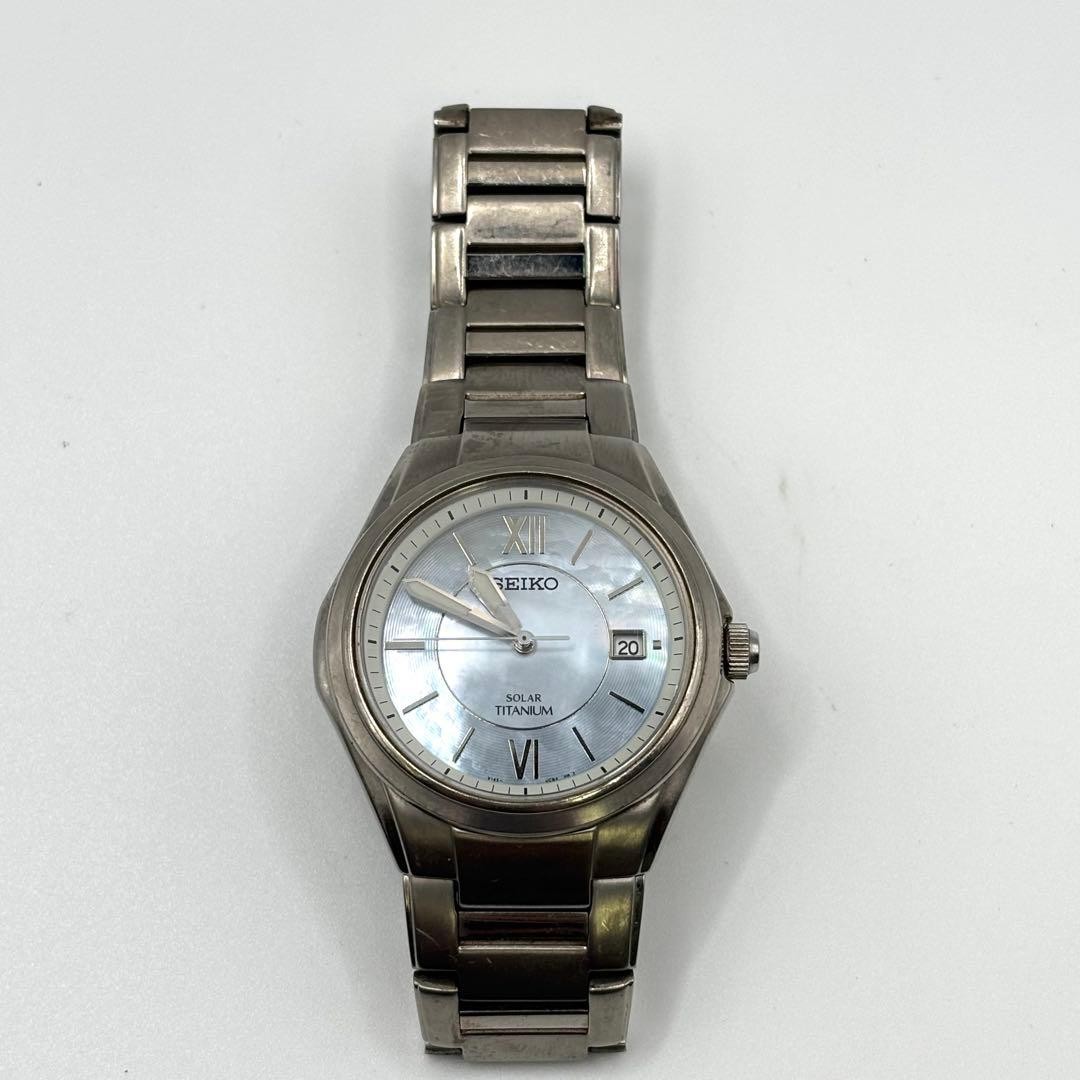 Working ,SEIKO solar-powered titanium watch with mother-of-pearl dial,From Japan