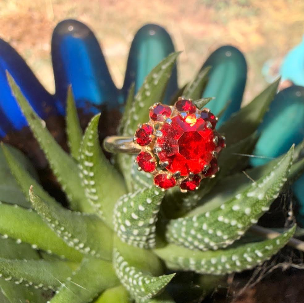 Deep Burgundy ring features a cluster of red rhinestones in a gold-tone setting.