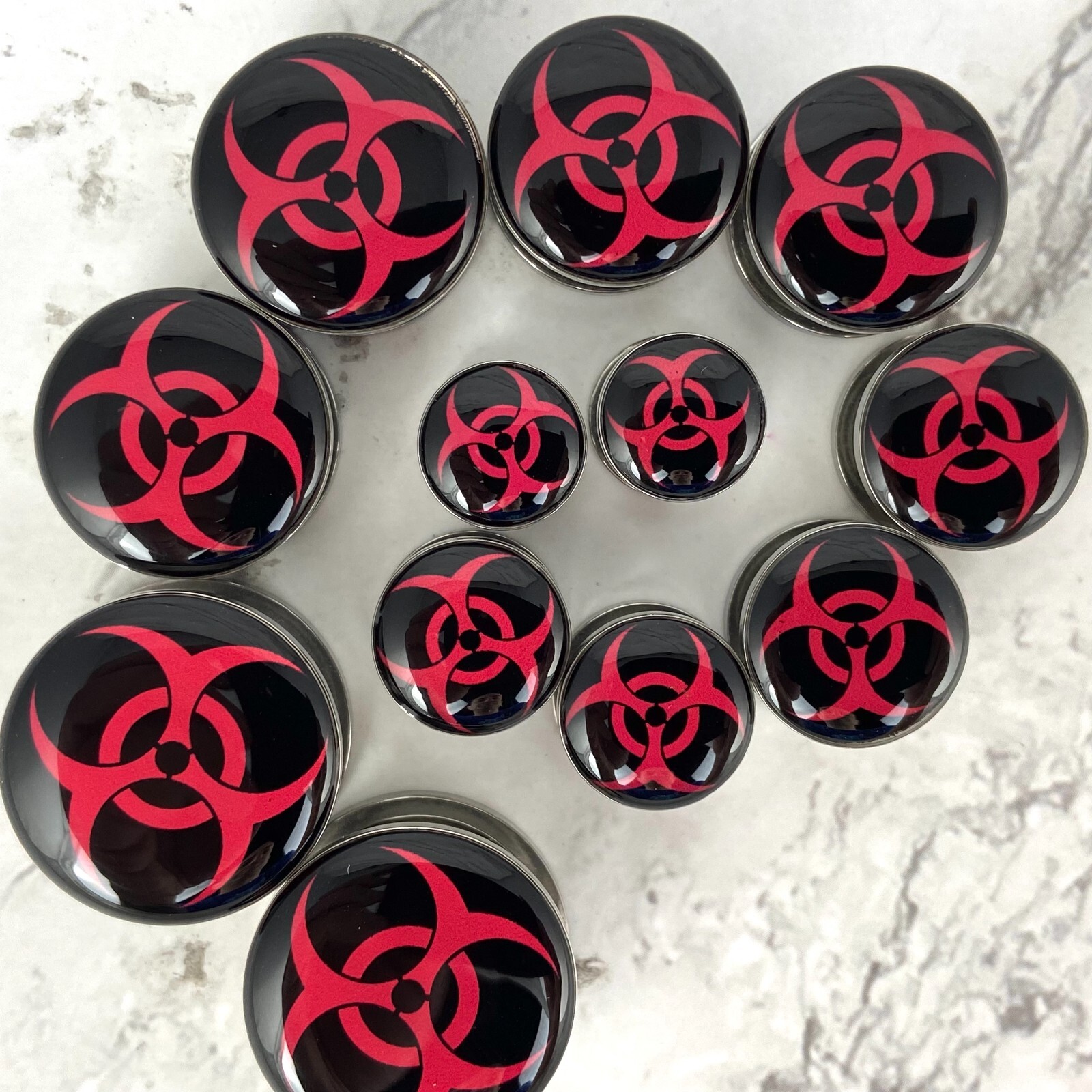 Pair of Screw on Black and Red Biohazard Picture Plugs gauges 16g thru 1 inch
