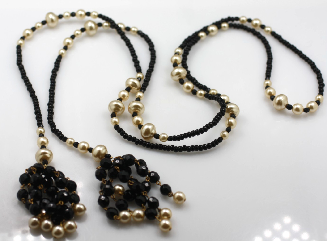 Vintage open ended tassel gold tone black glass faux pearl beaded necklace 56″