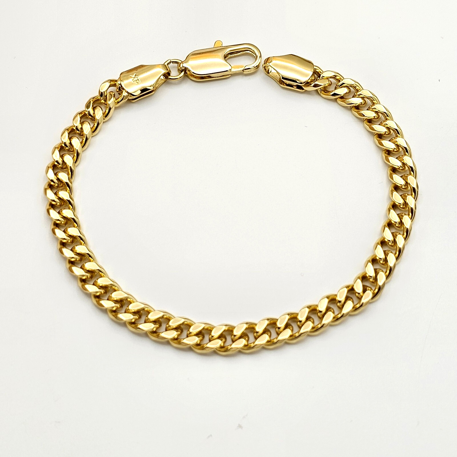 14K Gold Plated 5.5mm Cuban Chain Bracelet. 7.5 in. L Oro Laminado. Unisex