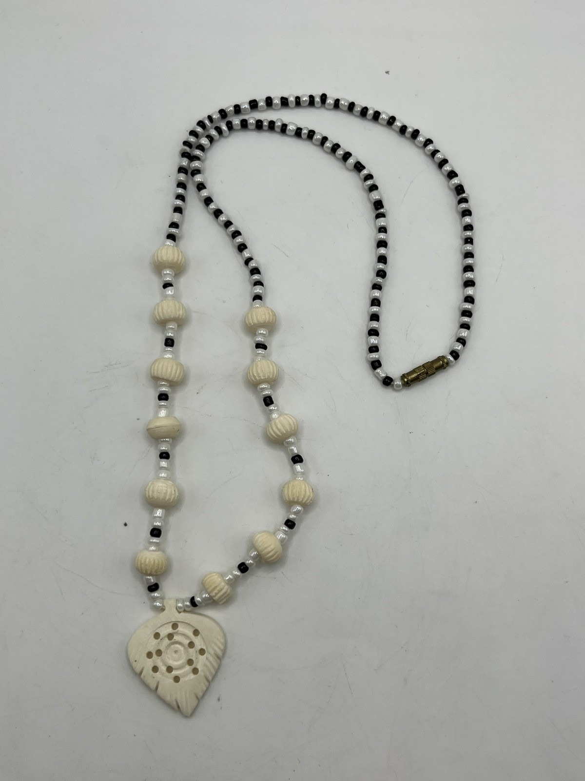 Carved Pendant Black and White Beaded Necklace 20”
