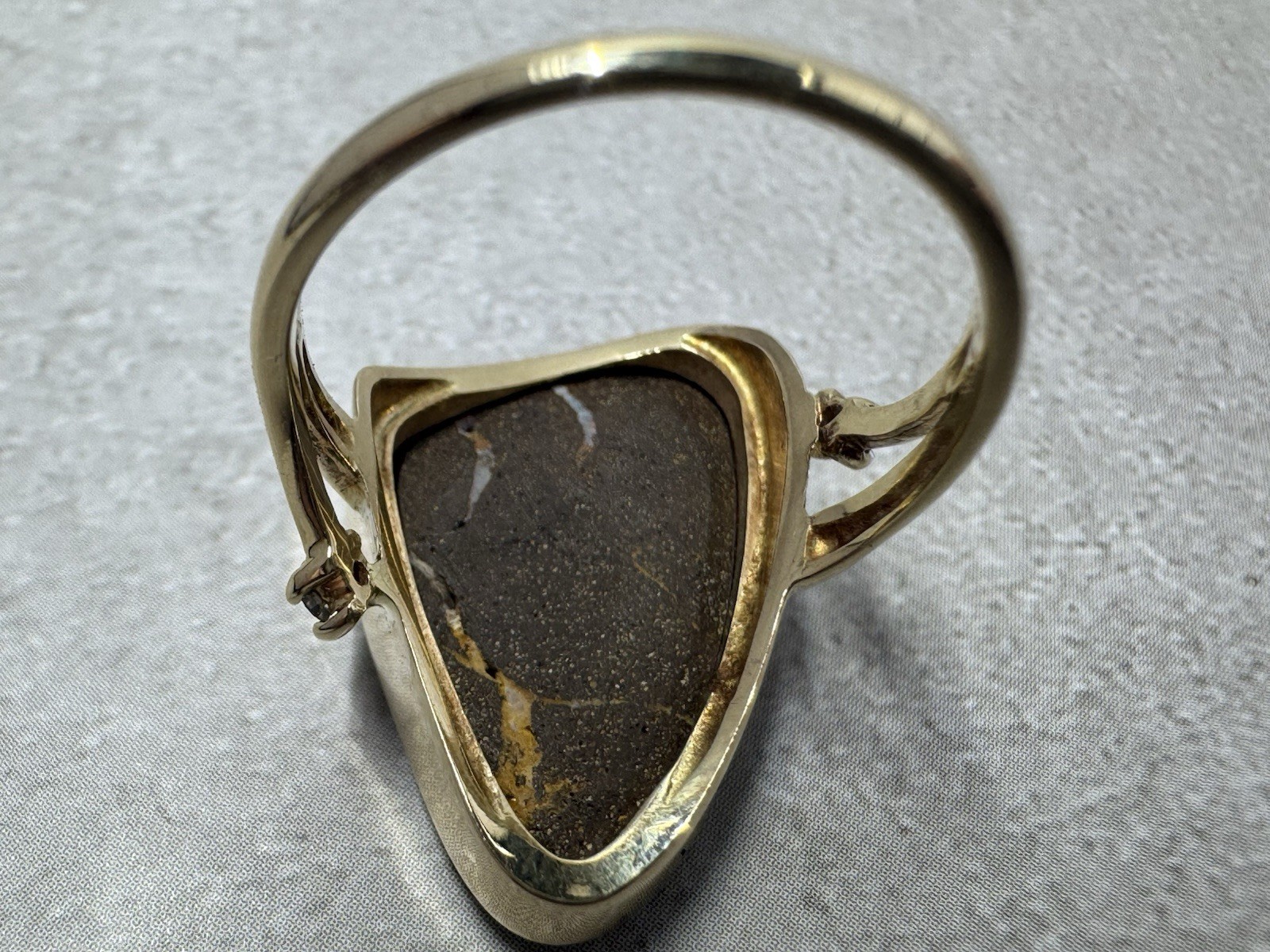 Natural Australian boulder opal with A 14k Gold ring And Diamonds. Ring size 8.