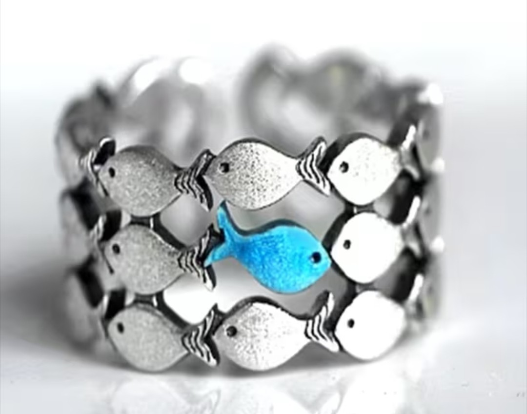 “Swim against the current” ring (blue fish)