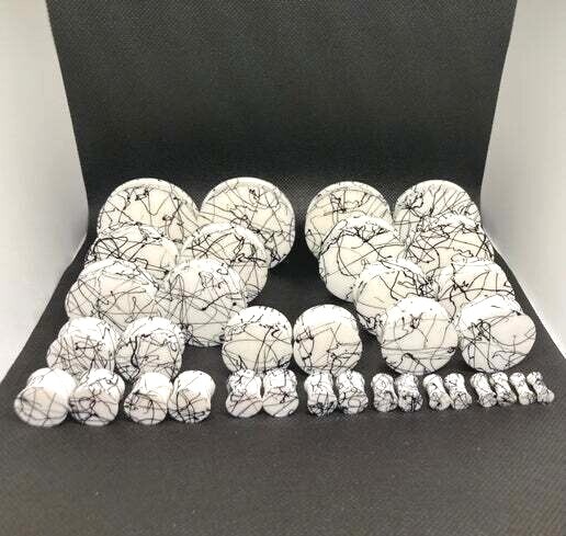 White and Black Splatter Silicone Double Flare Plugs 8g – 2″