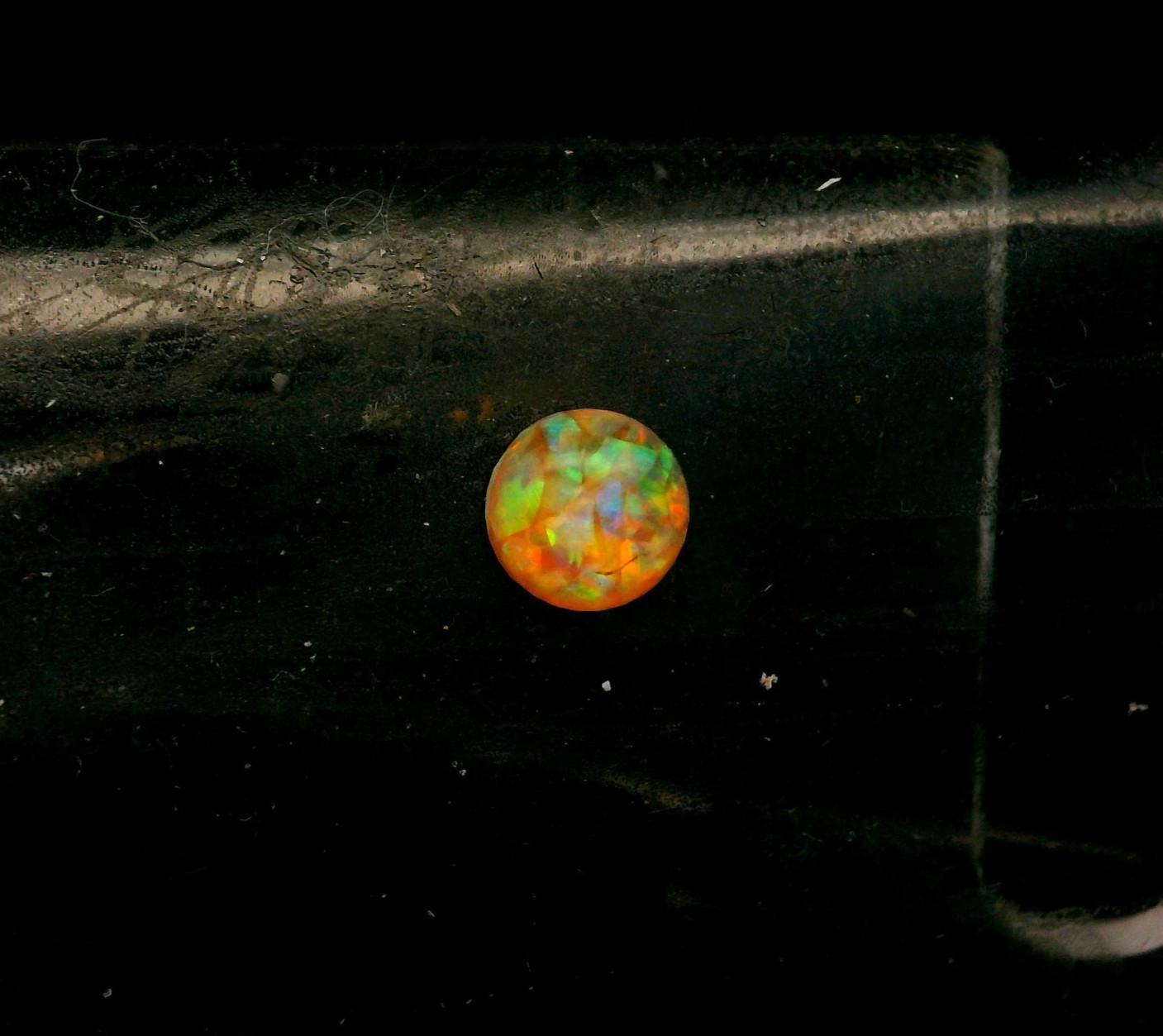 0.23ct Round Orange Multi-Color Opal 5 x 5 mm