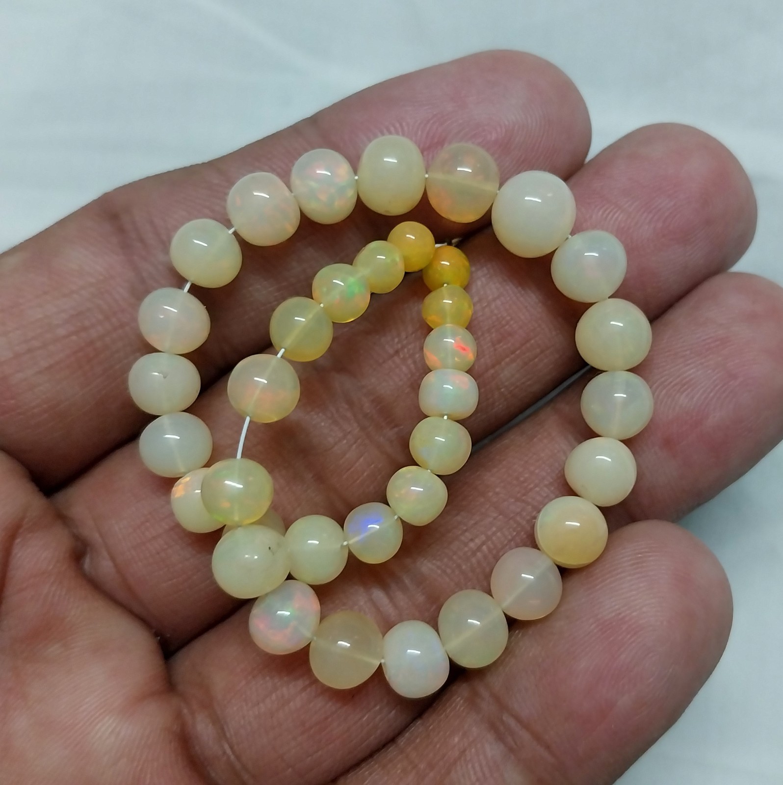 33 Carat 4.5 to 8 MM Natural Smooth Ethiopian Opal Ball Shape 8 inch Beads