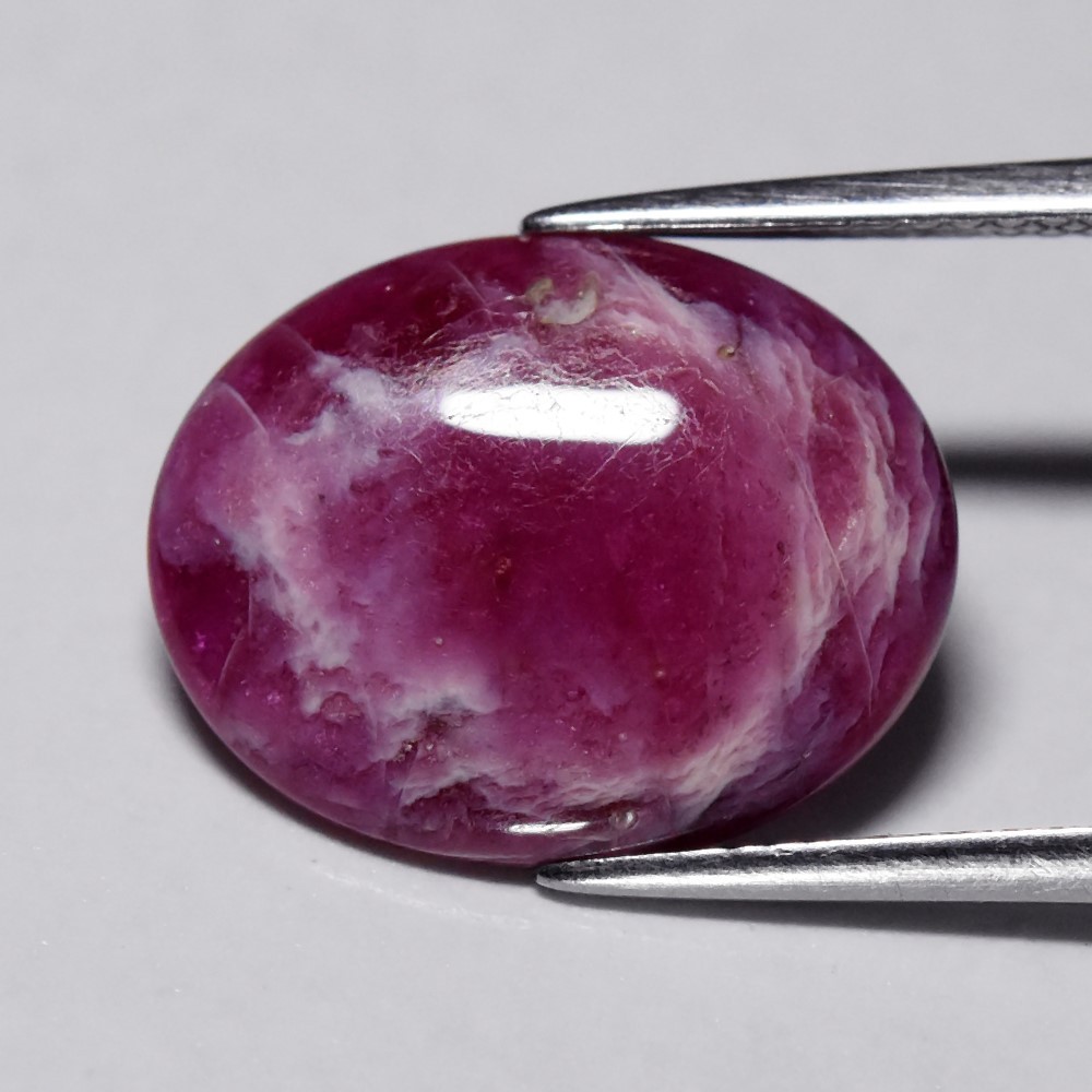 💎 7.54ct Oval Cabochon Purplish Red Ruby – Heated Glass Filled, Africa Gemstone