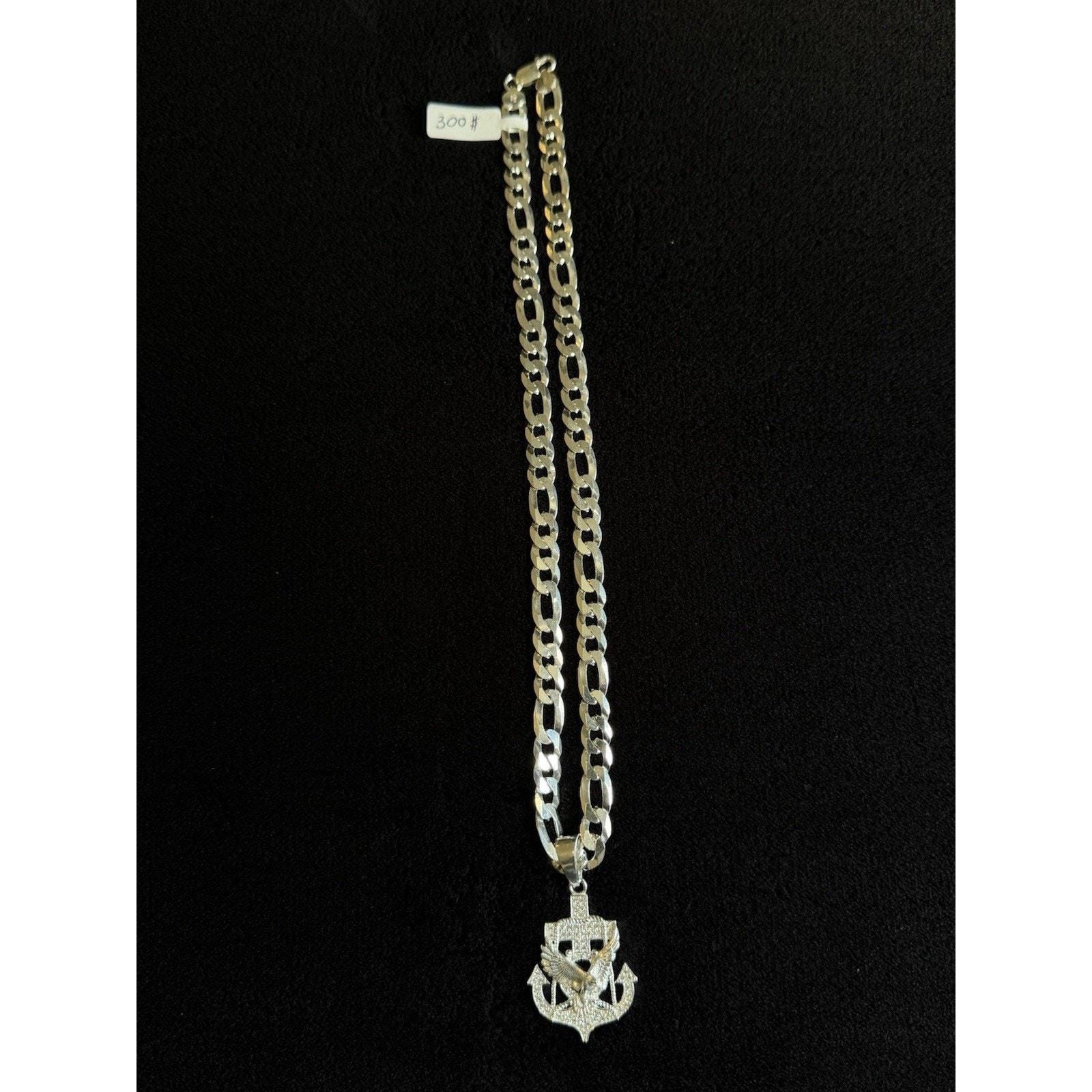 Cadena fígaro con dije de águila, en cruz de ancla plata 925