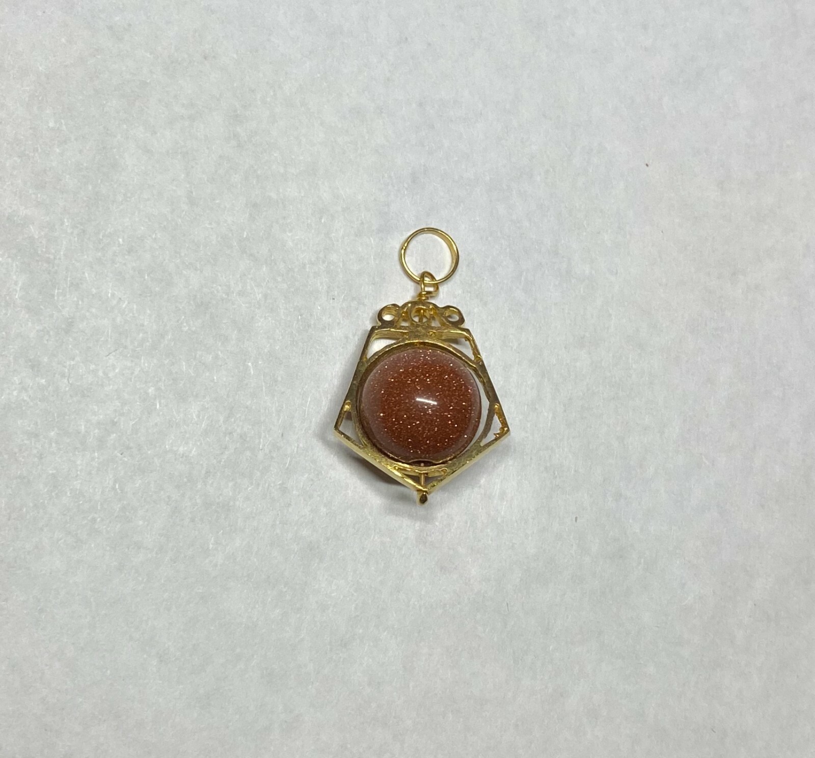 NOS 14K Ylw Gold Goldstone Venturina 10mm Bead Pentagon Shape Spinner Pendant