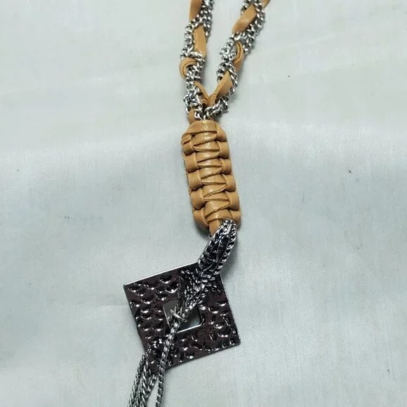 BKE tan leather with silver chain braided neck with hanging charms 27 inch NWT