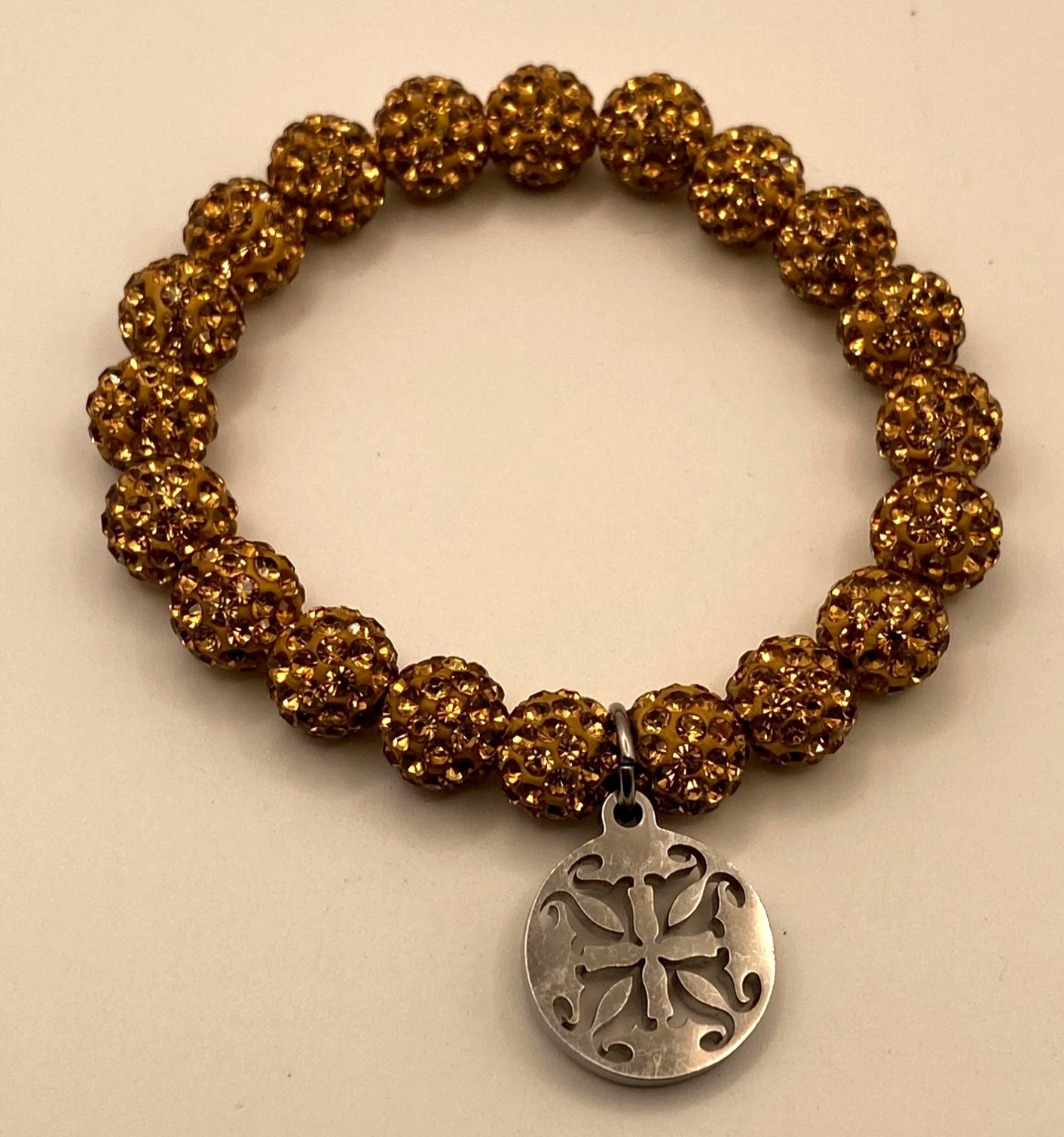 Rusted Cuff Gold Beaded Stretch Bracelet With Silver Charm Pendant