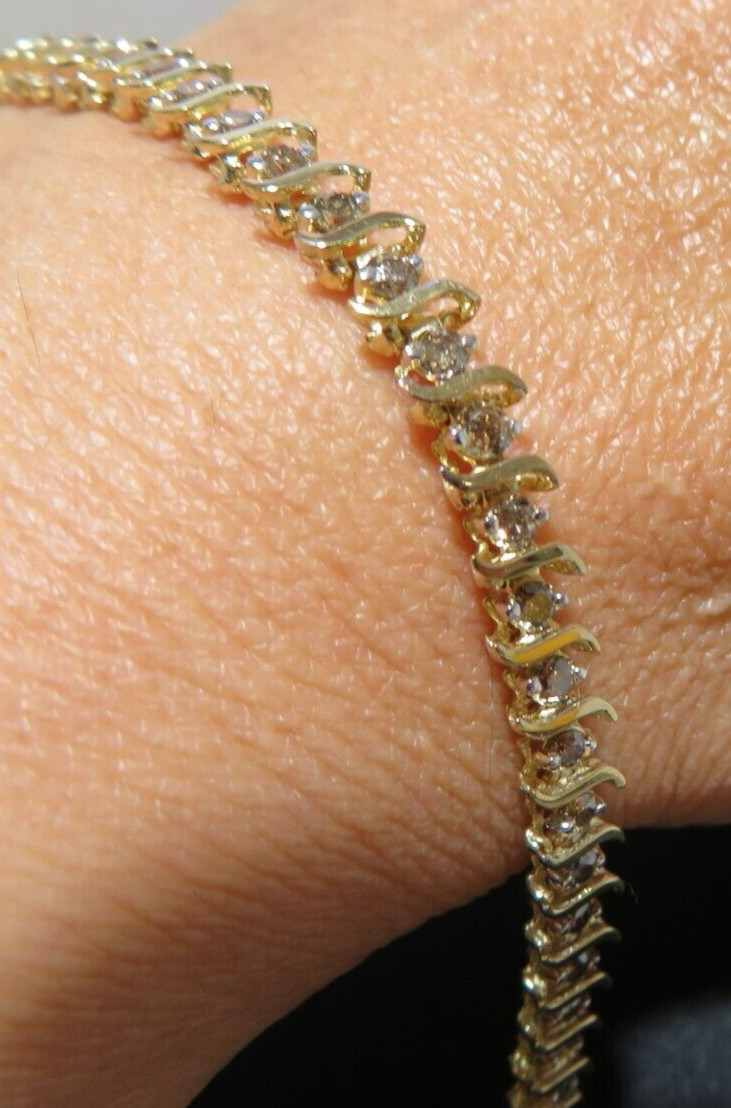 10K LADIES DIAMOND TENNIS BRACELET 1.00 tcw 7″ LONG 4.49 MM WIDE 6.42g(6132597-9