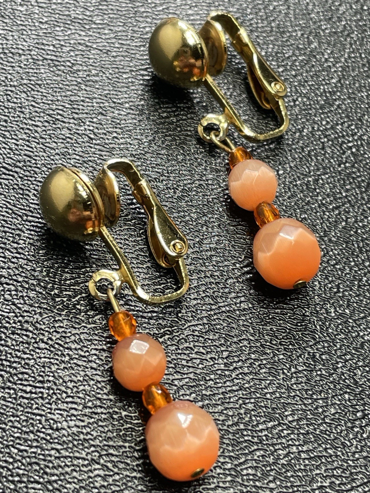Vintage 1.4” Orange Faceted Art Glass Gold Tone Dangle Clip Earrings