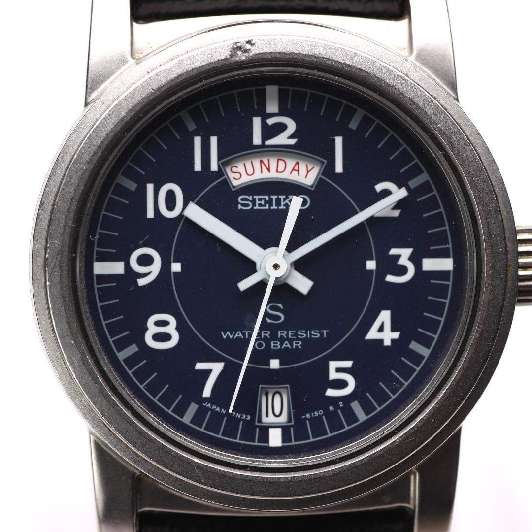Seiko SUS 7N33-6050 Men Quartz Wristwatch Black Dial 32mm Running