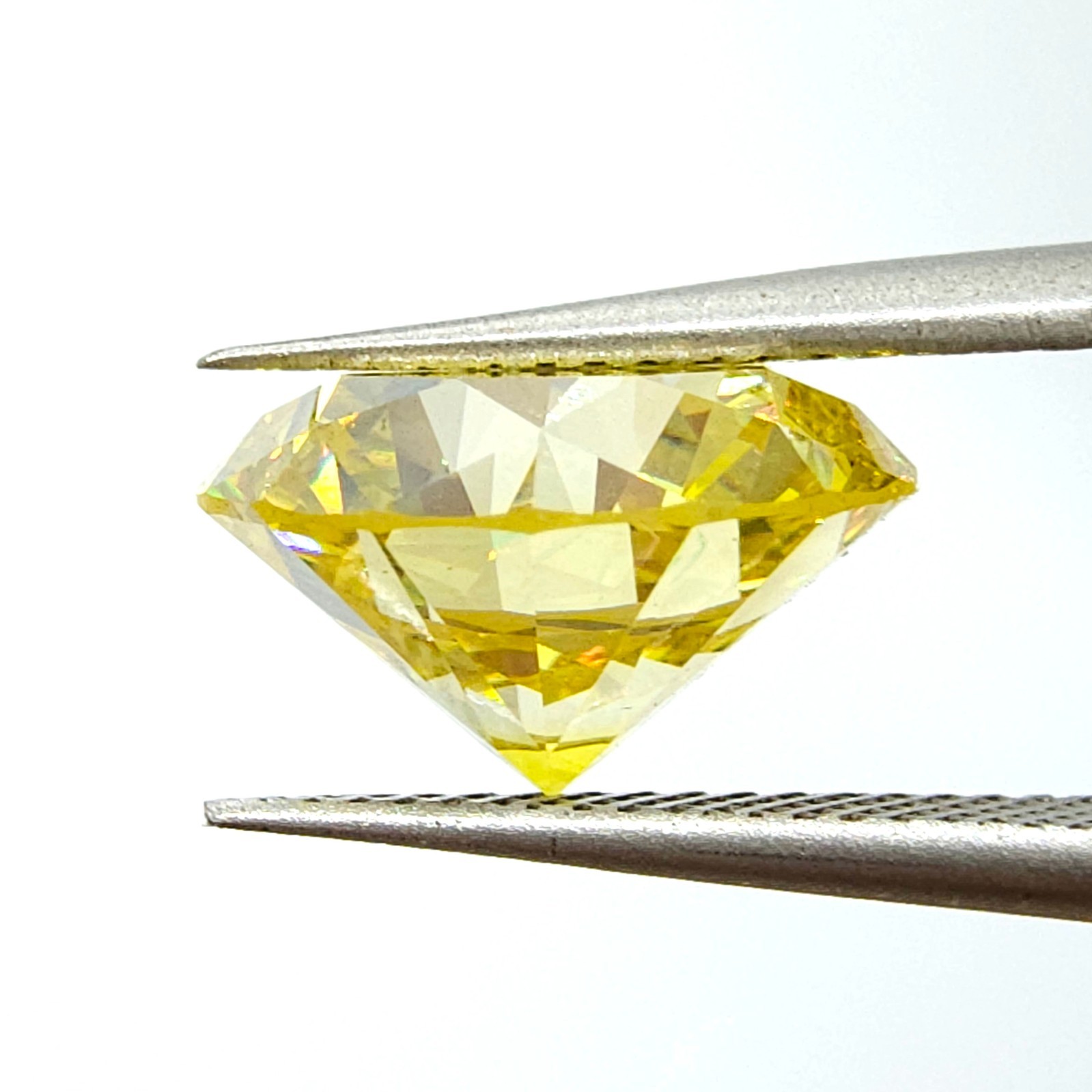 4.31 ct Fancy Vivid Yellow VS1 Round SGL Cert Treated Color & Clarity Enhanced