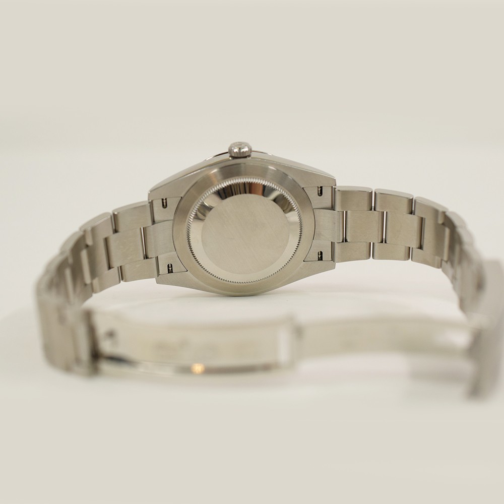 Rolex Oyster Perpetual 41 124300 Celebration Dial Steel Box & Papers Mint