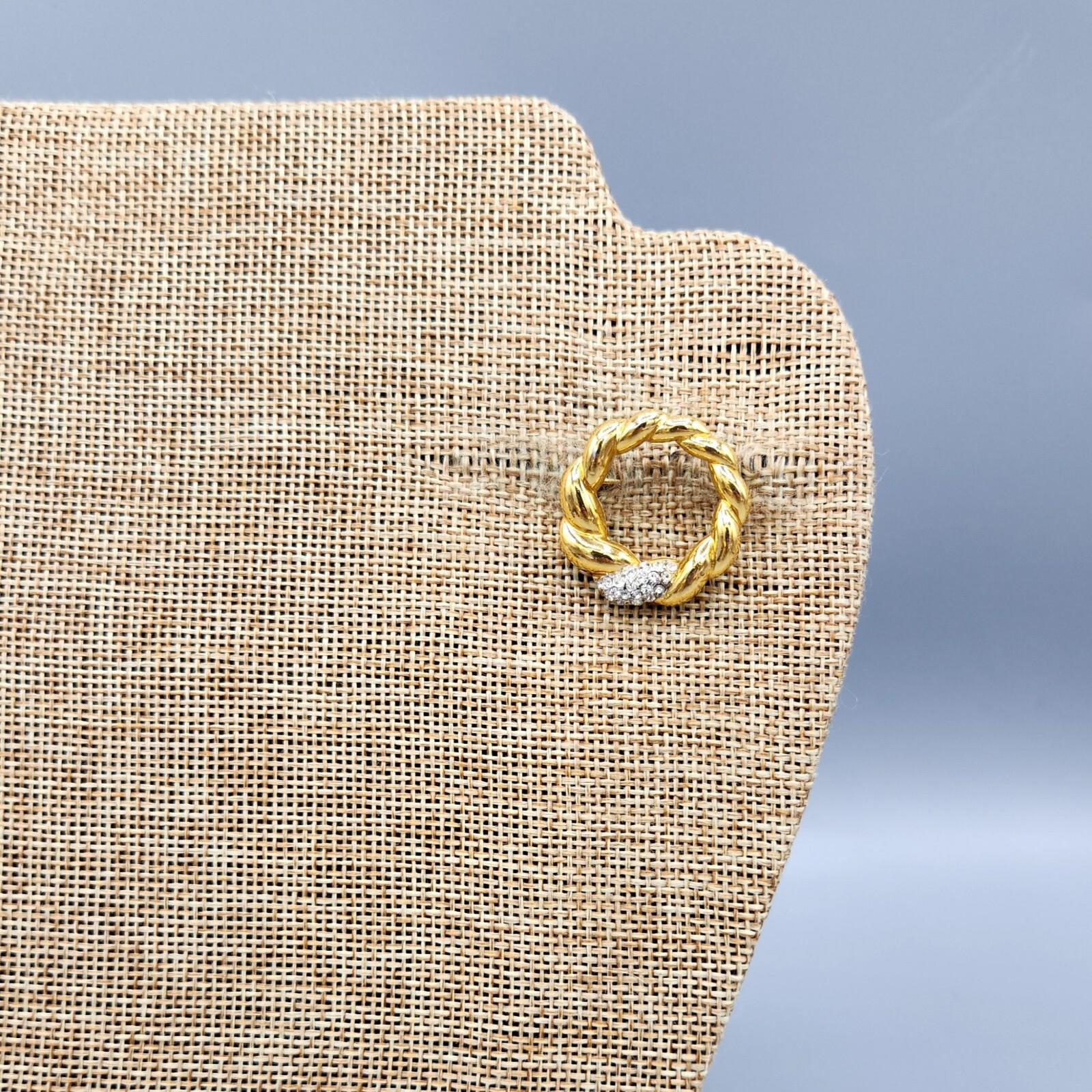 Crown Trifari Polished Gold Tone Crystal Pave Open Circle Twist Brooch