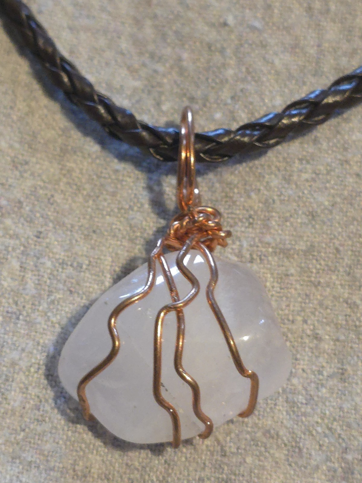 White Quartz Pendant On A Brown Leather Necklace
