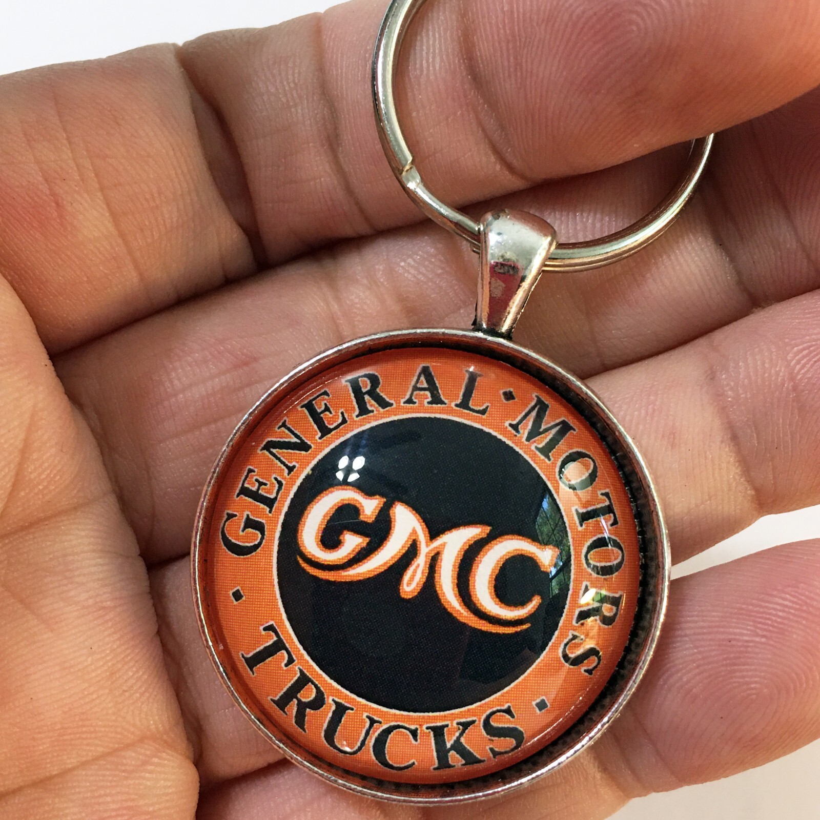Vintage GMC Trucks General Motors Sign Logo Emblem Orange 1.2″ Diameter Keychain