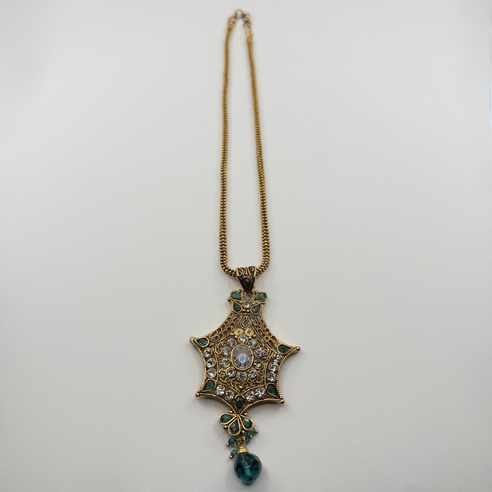 Gold Tone Ornate Multi Pointed Pendant Accented Clear Teal Rhinestone 16”