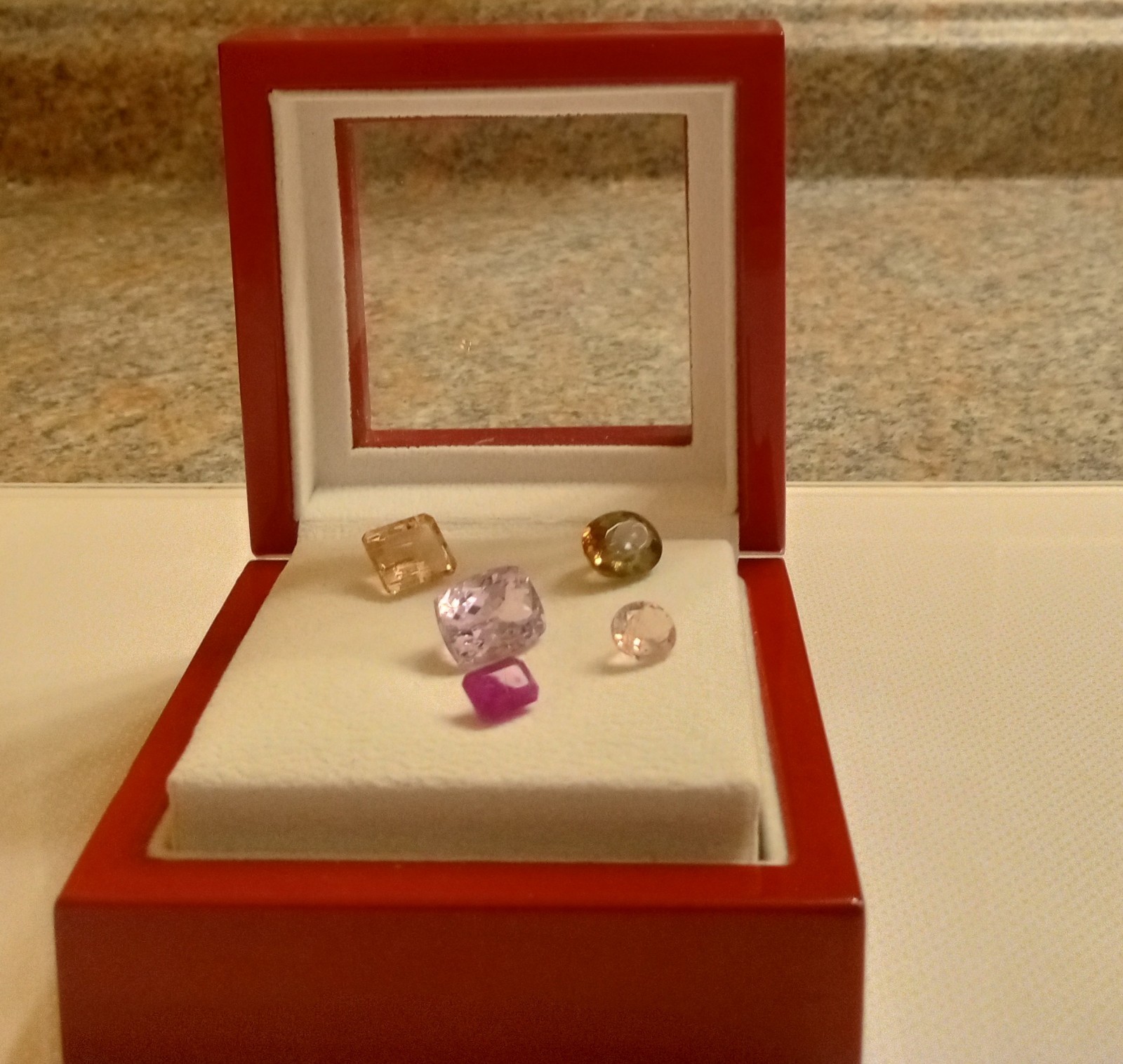 Lot of 5 Loose Cut gems. 1 Ruby, 2 Morganites, 1 Andelusite and 1 Kunzite.