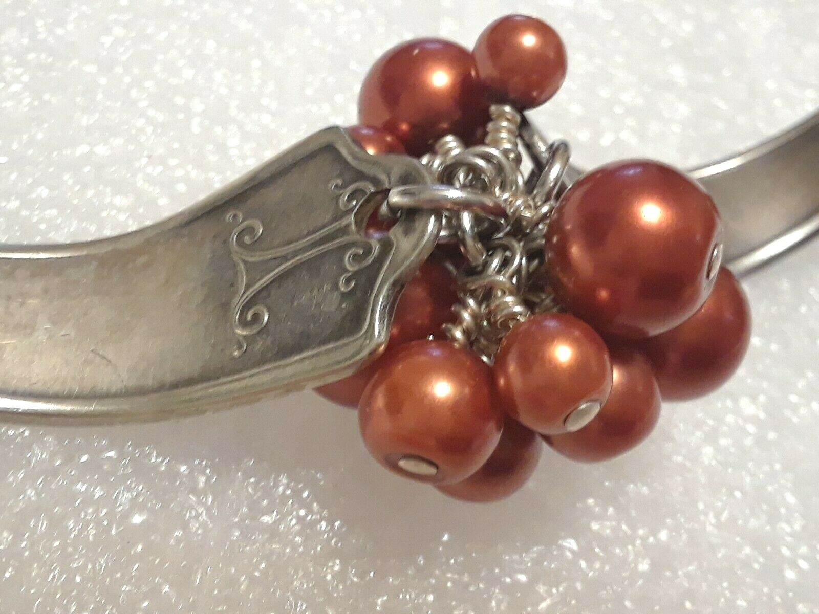 Spoon handle Bracelet. 2 piece with toggle clasp and burnt orange beads.