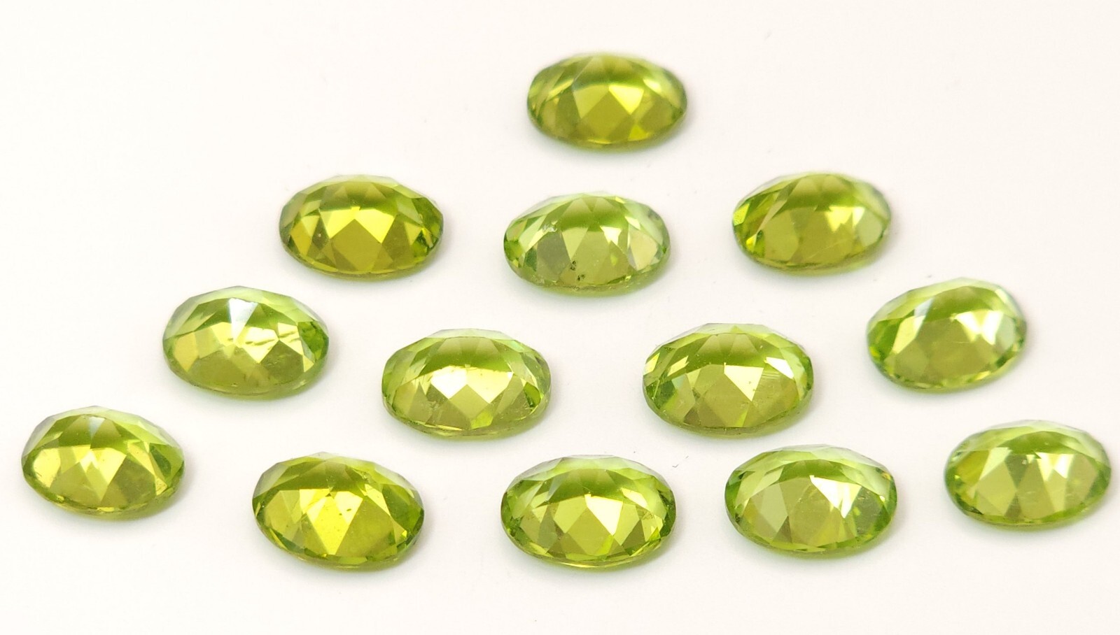 Set Of 13 2CT Natural light green Peridot Stones 9x7mm Oval Shaped 26CTW