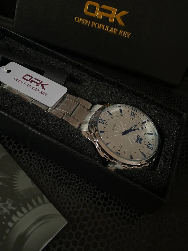 Classic Luxury Silver Quartz Watch with Blue Accents