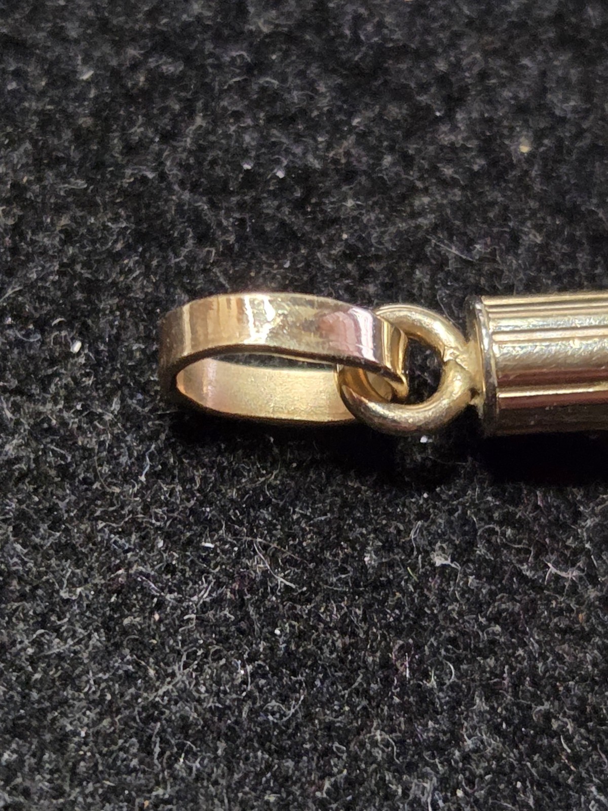 14 KT GOLD RELIGIOUS CROSS. 3.2 Grams