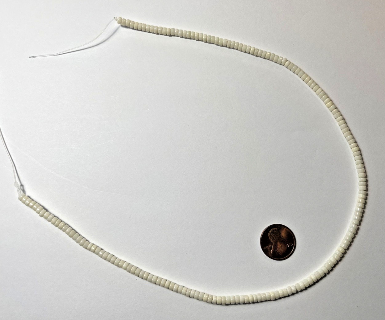 ONE 16″ STRAND WHITE SHELL SMOOTH HEISHI RONDELLES 4X2 MM BELOW WHOLESALE