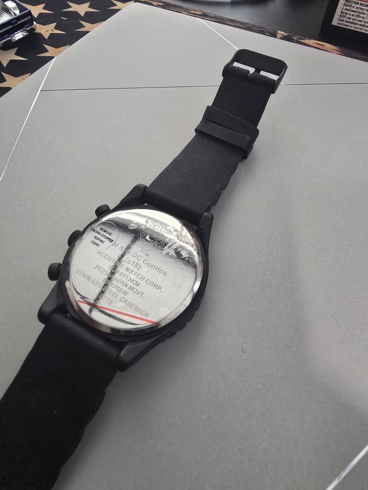 Accutime Superman Men’s Quartz Analog Black Dial Silicone Strap w/ Tin Box