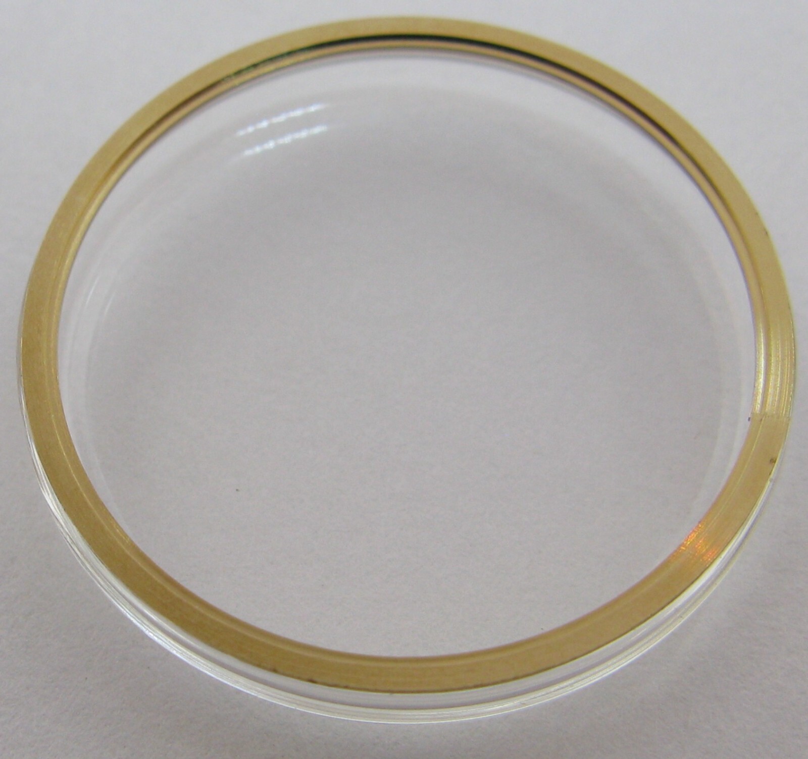 Omega Watch Crystal / Acrylic 24.7 mm yellow / gold tension ring